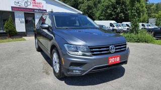CLEAN CARFAX REPORT No Accidents, One Owner<br><br>2018 VOLKSWAGEN TIGUAN TRENDLINE featuring Back up Camera, Cruise Control, Hand free phone, Panoramic Sunroof, Heated seats, Dual Air Conditioning,Trailer Sway Control, Battery w/Run Down Protection, Tilt/Telescoping Steering Column, Leather/Metal-Look Steering Wheel,  Alloy Wheels, Fixed Rear Window w/Fixed Interval Wiper and Defroster, Deep Tinted Glass, Variable Intermittent Wipers , Galvanized Steel/Aluminum Panels, Keyless Entry, Power Windows Roof Rack Rails Only, Auto On/Off Reflector Halogen Daytime Running Headlamps w/Delay-Off and more.<br><br>Purchase price: $ 16,588 plus HST and LICENSING<br><br>Safety package is available for $799 and includes Ontario Certification, 3 month or 3000 km Lubrico warranty ($1000 per claim) and oil change.<br>If not certified, by OMVIC regulations this vehicle is being sold AS-lS and is not represented as being in road worthy condition, mechanically sound or maintained at any guaranteed level of quality. The vehicle may not be fit for use as a means of transportation and may require substantial repairs at the purchaser   s expense. It may not be possible to register the vehicle to be driven in its current condition.<br><br>CARFAX PROVIDED FOR EVERY VEHICLE<br><br>WARRANTY: Extended warranty with variety terms and coverages is available, please ask our representative for more details.<br>FINANCING: Regardless of your credit score, we are committed to assisting you in obtaining a customized car loan that suits your specific circumstances. Our goal is to help you enhance your credit score significantly by the time you complete your loan term. Our specialists are happy to assist you with all necessary information.<br>TRADE-IN OR SELL: Upgrade your ride by trading-in your vehicle and save on taxes, or Sell it to us, and get the best value for your current vehicle.<br><br>Smart Wheels Used Car Dealership     OMVIC Registered Dealer<br>642 Dunlop St West, Barrie, ON L4N 9M5<br>Phone: 705-721-1341 ext 201<br>Email: Info@swcarsales.ca<br>Web: www.swcarsales.ca<br>Terms and conditions may apply. Price and availability subject to change. Contact us for the latest information<br>