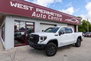 This beautiful AT4-X is now available . With only 20,000 kms, it is like new. It shines in Summit White accented in the interior with Obsidian Rush. This truck also has a top-line flip up tonneau cover. This AT4-X is loaded with features.


**6.2L Ecotec3 V8 Engine
**Automatic Emergency Braking
**Forward Collision Alert
**Front Pedestrian Braking
**Lane Keep Assist W/Lane Departure Warning
**Trailer Side Blind Zone Alert
**HD Surround Vision W/ Bed View
**2-Speed Automatic Transfer Case
**Skid Plates
**Trailering Package
**Apple Car Play & Android Auto
**15"Head Up Display
**12.3" Diag Digital Driver Information Centre
**Keyless Open & Remote Start
**Power Sunroof
**Heated & Ventilated Driver and Front Passenger Seats
**16-Way Power Front Seats Including Lumbar & Massage 
**12 Speaker Bose Premium Sound System
**GMC MultiPro Tailgate

Yes this is a beauty!! Call today to see and test drive this "Like New" GMC Sierra AT4-X.

West Perimeter Auto Centre is a family-owned and operated used car dealer in Winnipeg, which is an A+ Rated Member of the Better Business Bureau. We have been at this location serving our neighbours for over 25 years. 
                                    WE NEED YOUR USED CARS, SUVS AND TRUCKS
                                     WE WILL PAY TOP DOLLAR FOR YOUR TRADE!!                                                                          All of our vehicles come with our complete 150-point inspection, Manitoba Safety, fresh oil and filter, and Free CarFax report. The advertised price is ALL INCLUSIVE- NO HIDDEN EXTRAS, plus applicable taxes.    We ALWAYS welcome trade-ins.                                                                                                                                           CALL TODAY for your no-obligation test drive. Bank Financing & leasing are available at competitive rates from one of the many financial institutions represented. Apply online today with a quick credit application. West Perimeter Auto Centre 3811 Portage Avenue Winnipeg, Manitoba. Visit us today in person or visit us online at www.westperimeter.com!! Dealer Permit #9699