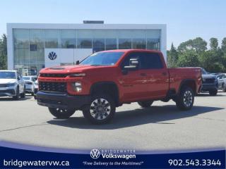 Recent Arrival! Red 2022 Chevrolet Silverado 2500HD Custom Bluetooth | Apple CarPlay | Android Auto 4WD 6-Speed Automatic 6.6L V8 Bridgewater Volkswagen, Located in Bridgewater Nova Scotia.6-Speed Automatic, 4WD, Jet Black Cloth, 170 Amp Alternator, 2-Speed Electronic Shift Transfer Case, 3.5 Diagonal Monochromatic Display DIC, 3.73 Rear Axle Ratio, 4-Wheel Disc Brakes, 6 Speakers, 6-Speaker Audio System, 720 Cold-Cranking Amps Heavy-Duty Battery, ABS brakes, Air Conditioning, Alloy wheels, AM/FM radio, Apple CarPlay/Android Auto, Black Mirror Caps, Bluetooth® For Phone, Body Colour Front Grille, Brake assist, Cloth Seat Trim, Colour-Keyed Carpeting Floor Covering, Deep-Tinted Glass, Delay-off headlights, Driver door bin, Dual front impact airbags, Dual front side impact airbags, Electronic Cruise Control w/Set & Resume Speed, Electronic Stability Control, Exterior Parking Camera Rear, Front 40/20/40 Split-Bench Seats, Front anti-roll bar, Front reading lights, Front Rubberized Vinyl Floor Mats, Front wheel independent suspension, Fully automatic headlights, Heated door mirrors, Heated Vertical Trailering Mirrors, Illuminated entry, Locking Tailgate, Low tire pressure warning, Manual Tailgate Function w/No EZ Lift, Manual Tilt-Wheel Steering Column, Occupant sensing airbag, Outside temperature display, Overhead airbag, Overhead console, Panic alarm, Passenger door bin, Passenger vanity mirror, Power Door Locks, Power door mirrors, Power Front Windows w/Driver Express Up/Down, Power Front Windows w/Passenger Express Down, Power Rear Windows w/Express Down, Power steering, Power windows, Premium audio system: Chevrolet Infotainment 3, Radio: Chevrolet Infotainment 3 System, Rear 60/40 Folding Bench Seat (Folds Up), Rear reading lights, Rear Rubberized Vinyl Floor Mats, Rear step bumper, Remote Keyless Entry, Remote keyless entry, Speed control, Split folding rear seat, Standard Tailgate, Suspension Package, Tachometer, Tilt steering wheel, Traction control, Trip computer, Turn signal indicator mirrors, Variably intermittent wipers, Voltmeter.Certification Program Details: 150 Points Inspection Fresh Oil Change Free Carfax Full Detail 2 years MVI Full Tank of Gas The 150+ point inspection includes: Engine Instrumentation Interior components Pre-test drive inspections The test drive Service bay inspection Appearance Final inspection