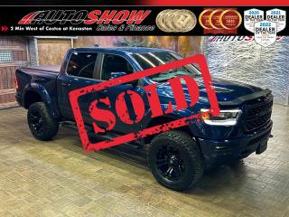 <strong>*** LIFTED 4X4 RAM 1500 SPORT CREW CAB *** HEATED SEATS, HEATED STEERING WHEEL, REMOTE START *** 12.0 INCH TOUCHSCREEN, NAVIGATION, LEATHER W/ CLOTH INSERTS *** </strong>Get in behind the wheel of the 2022 RAM 1500 and experience a world of refined power and luxury!  This RAM is packed with cutting-edge technology and upgrades guaranteed to turn heads as youre driving to you destination! This truck is loaded with features such as <b>HEATED SEATS</b>......<strong>HEATED STEERING WHEEL</strong>......<strong>12.0 INCH TOUCHSCREEN</strong>......<strong>REMOTE START</strong>......Leather interior w/ Cloth Inserts......<strong>UCONNECT</strong>......Navigation......9 Amplified Speaker w/ Subwoofer......<strong>SPORT PERFORMANCE HOOD</strong>......Dual Climate-Zone......<b>COLOUR-MATCHED FENDER FLARES</b>......Tonneau Cover......Bedliner......Aeroskin Hood Protector......<strong>RUNNING BOARDS</strong>......<strong>CLASS IV RECEIVER HITCH</strong>......Trailer Brake Control......Power Adjustable Pedals......Reverse Camera......<strong>ELECTRONIC STABILITY CONTROL</strong>......Ready Alert Braking......Trailer Sway Control......Rain Brake Support......Traction Control......Electronic Roll Mitigation......Hill Start Assist......USB A & C Inputs......AUX Media Input......Foldable Rear Centre Seat w/ Cupholders......<strong>5.7L HEMI V8 </strong>Engine......Automatic......<strong>20 INCH ALLOY RIMS </strong>w/ <b>BFGOODRICH TIRES</b>!!<br /><br />This vehicle comes with only <strong>14,500 KILOMETERS </strong>and original Books and Manuals!! Financing and Extended Warranty available!!<br /><br /><br />Will accept trades. Please call (204)560-6287 or View at 3165 McGillivray Blvd. (Conveniently located two minutes West from Costco at corner of Kenaston and McGillivray Blvd.)<br /><br />In addition to this please view our complete inventory of used <a href=\https://www.autoshowwinnipeg.com/used-trucks-winnipeg/\>trucks</a>, used <a href=\https://www.autoshowwinnipeg.com/used-cars-winnipeg/\>SUVs</a>, used <a href=\https://www.autoshowwinnipeg.com/used-cars-winnipeg/\>Vans</a>, used <a href=\https://www.autoshowwinnipeg.com/new-used-rvs-winnipeg/\>RVs</a>, and used <a href=\https://www.autoshowwinnipeg.com/used-cars-winnipeg/\>Cars</a> in Winnipeg on our website: <a href=\https://www.autoshowwinnipeg.com/\>WWW.AUTOSHOWWINNIPEG.COM</a><br /><br />Complete comprehensive warranty is available for this vehicle. Please ask for warranty option details. All advertised prices and payments plus taxes (where applicable).<br /><br />Winnipeg, MB - Manitoba Dealer Permit # 4908     <p>Sold to another happy customer</p>
