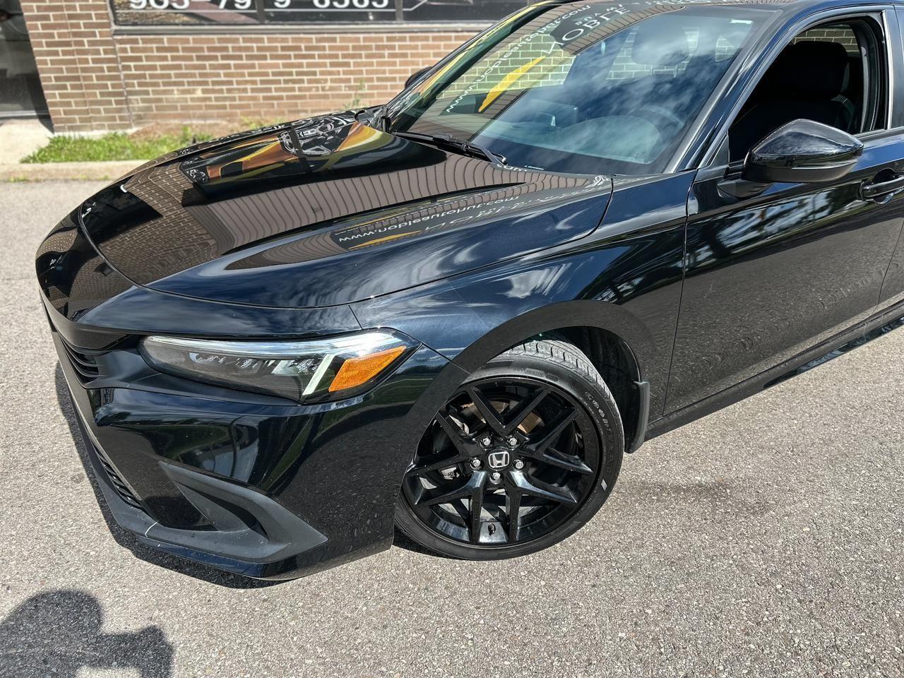 2023 Honda Civic Sport Photo2