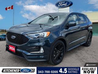 Stone Blue Metallic 2024 Ford Edge ST Line 4D Sport Utility EcoBoost 2.0L I4 GTDi DOHC Turbocharged VCT 8-Speed Automatic AWD AWD, 3.80 Axle Ratio, 4-Wheel Disc Brakes, 6 Speakers, ABS brakes, Active Transmission Warm-Up, Adaptive Cruise Control w/Stop & Go, Air Conditioning, Alloy wheels, AM/FM radio: SiriusXM with 360L, Auto High-beam Headlights, Auto-dimming Rear-View mirror, Automatic temperature control, Brake assist, Bumpers: body-colour, Cold Weather Package, Compass, Connected Navigation System, Delay-off headlights, Driver door bin, Driver vanity mirror, Dual front impact airbags, Dual front side impact airbags, Electronic Stability Control, Emergency communication system: SYNC 4 911 Assist, Equipment Group 250A, Evasive Steering Assist, Ford Co-Pilot360 Assist+, Four wheel independent suspension, Front & Rear Floor Liners w/Carpet Mats, Front anti-roll bar, Front Bucket Seats, Front dual zone A/C, Front fog lights, Front Heated ActiveX Trimmed Bucket Seats, Front reading lights, Fully automatic headlights, Garage door transmitter, Heated door mirrors, Heated front seats, Heated Steering Wheel, Illuminated entry, Knee airbag, Lane Centring, Leather steering wheel, Low tire pressure warning, Navigation System, Occupant sensing airbag, Outside temperature display, Overhead airbag, Overhead console, Panic alarm, Panoramic Vista Roof, Passenger door bin, Passenger vanity mirror, Power door mirrors, Power driver seat, Power Liftgate, Power passenger seat, Power steering, Power windows, Radio: AM/FM Stereo/MP3 Capable, Rear anti-roll bar, Rear Parking Sensors, Rear reading lights, Rear window defroster, Rear window wiper, Remote keyless entry, Security system, Speed control, Speed-Sensitive Wipers, Split folding rear seat, Spoiler, Steering wheel mounted audio controls, SYNC 4A w/Enhanced Voice Recognition, Tachometer, Telescoping steering wheel, Tilt steering wheel, Traction control, Trip computer, Variably intermittent wipers, Wheels: 20 Premium Gloss Black-Painted Aluminum.