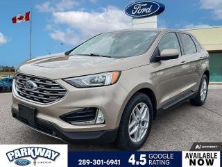 Desert Gold Metallic 2021 Ford Edge SEL 201A 201A 4D Sport Utility EcoBoost 2.0L I4 GTDi DOHC Turbocharged VCT 8-Speed Automatic AWD AWD, 3.36 Axle Ratio, Adaptive Cruise Control w/Stop & Go, Air Conditioning, Alloy wheels, Auto High-beam Headlights, Cold Weather Package, Connected Built-In Touchscreen Navigation System, Delay-off headlights, Equipment Group 201A, Evasive Steering Assist, Ford Co-Pilot360 Assist+, Front & Rear Floor Liners w/Carpet Mats, Front dual zone A/C, Front fog lights, Fully automatic headlights, Heated front seats, Heated Steering Wheel, Lane Centreing, Passenger door bin, Power steering, Power windows, Radio: AM/FM Stereo/MP3 Capable, Rear window defroster, Rear window wiper, Remote keyless entry, Steering wheel mounted audio controls, SYNC 4A w/Enhanced Voice Recognition, Telescoping steering wheel, Tilt steering wheel, Variably intermittent wipers.