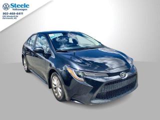 The 2021 Toyota Corolla LE is a popular trim of the well-known compact sedan, recognized for its reliability, fuel efficiency, and practicality. Here are the key features and aspects of the 2021 Toyota Corolla LE:  1.   *Engine and Performance*: The Corolla LE is powered by a 1.8-liter four-cylinder engine, which typically produces around 139 horsepower. It is paired with a continuously variable transmission (CVT) that provides smooth acceleration and enhances fuel efficiency. The Corolla LE is designed primarily for everyday commuting and offers a comfortable and predictable driving experience.  2.   *Interior*: The interior of the 2021 Corolla LE is comfortable and straightforward, with seating for up to five passengers. Standard features often include cloth upholstery, a 7-inch touchscreen infotainment system with Apple CarPlay and Android Auto compatibility, Bluetooth connectivity, a USB port, and a six-speaker sound system. The cabin is well-built with quality materials, offering a pleasant environment for both short and long drives.  3.   *Safety*: Toyota prioritizes safety, and the Corolla LE comes equipped with Toyota Safety Sense 2.0 (TSS 2.0) as standard. This includes advanced driver assistance features such as pre-collision system with pedestrian detection, lane departure alert with steering assist, dynamic radar cruise control, lane tracing assist, and road sign assist. Additionally, it typically includes stability control, traction control, antilock brakes, and a rearview camera.  4.   *Fuel Efficiency*: One of the highlights of the Corolla LE is its excellent fuel economy. It typically achieves high mileage ratings, making it an economical choice for daily commuting and longer trips.  5.   *Practicality*: The Corolla LE offers a decent amount of trunk space for a compact sedan, accommodating groceries, luggage, or other cargo with ease. The rear seats can be folded down in a 60/40 split to further increase cargo capacity when needed.  6.   *Driving Experience*: The Corolla LE is known for its smooth and predictable driving dynamics. It provides a comfortable ride quality suitable for city driving and highway cruising. The steering is responsive, making it easy to maneuver in tight spaces.Overall, the 2021 Toyota Corolla LE is a reliable and practical choice in the compact sedan segment, offering a blend of comfort, safety, fuel efficiency, and modern technology features. It appeals to buyers looking for a dependable daily driver with Toyotas reputation for longevity and low maintenance costs.As a Steele Auto Certified vehicle, you have peace of mind that the vehicle has undergone a rigorous 85 point inspection and has been brought up to the highest of standards. Dont forget, at Steele Volkswagen we have financing options available for all credit situations!