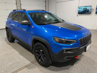 <div>Freedom has no boundaries. This 2019 Jeep Cherokee Trailhawk is powered by a 2.0L turbocharged I-4 engine, with a 9 speed automatic transmission and four wheel drive. Features in the 2019 Jeep Cherokee Trailhawk include 17 inch black aluminum wheels, ParkView rear back up camera, 8.4 inch touchscreen display, Apple CarPlay and Android Auto compatibility, hands free power liftgate, power adjustable front seats with lumbar support with memory function, auto dimming rearview mirror with memory function, heated and cooling leather front seats, keyless entry and start, heated steering wheel, remote start, blind spot detection, side distance warning, parallel/perpendicular park assist, forward collision assist, rain sensing windshield wipers, lane departure warning, lane keep assist, adaptive cruise control, GPS navigation.</div><br /><div><br></div><br /><div><span id=docs-internal-guid-5dcecd62-7fff-d3ba-0725-a527f258d672><span>At Sisson Auto, we make buying a vehicle a seamless and stress-free experience. Our transparent pricing eliminates haggling and eliminates any hidden fees. To give you peace of mind, we offer a 3-day/600 km No-Hassle Return Policy, a 30-day exchange privilege, minimum warranties with 24-hour roadside assistance, a check for safety recalls, and a complimentary CarFax history report. Plus, home delivery is free within 200 km. Dealer permit #5471.</span></span><br></div>