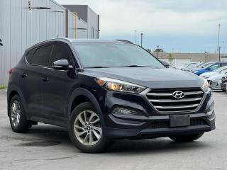 Ash Black 2016 Hyundai Tucson Premium PREMIUM | AWD | AC | BACK UP CAMERA | PREMIUM | AWD | AC | BACK UP CAMERA | 4D Sport Utility I4 6-Speed Automatic with Overdrive AWD | Heated Seats, | Bluetooth, AWD, 4-Wheel Disc Brakes, 6 Speakers, ABS brakes, Air Conditioning, Alloy wheels, Brake assist, CD player, Electronic Stability Control, Exterior Parking Camera Rear, Fully automatic headlights, Heated front seats, Panic alarm, Power steering, Power windows, Rear window defroster, Remote keyless entry, Security system, Steering wheel mounted audio controls, Telescoping steering wheel, Tilt steering wheel, Traction control, Trip computer.<br><br>Awards:<br>  * IIHS Canada Top Safety Pick+, Top Safety Pick+<br><br>Reviews:<br>  * Most owners say this era of Tucson attracted their attention with unique exterior styling, and sealed the deal with a great balance of comfortable ride quality and sporty, spirited driving dynamics. Bang-for-the-buck was highly rated as well. Source: autoTRADER.ca
