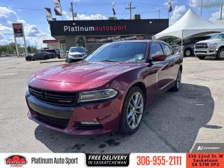 <b>Android Auto,  Apple CarPlay,  Uconnect,  Aluminum Wheels,  Proximity Key!</b><br> <br>    This Dodge Charger is bold, muscular, and loaded with heritage. This  2021 Dodge Charger is for sale today. <br> <br>Blending muscle car styling with modern performance and technology, this Dodge Charger is a full-size sedan with attitude. It delivers even more performance than you might expect given its level of comfort and day-to-day usability. From the driver seat to the backseat, this Dodge Charger was crafted to provide the ultimate in high-performance comfort and road-ready confidence. This  sedan has 84,922 kms. Its  red in colour  . It has a 8 speed automatic transmission and is powered by a  300HP 3.6L V6 Cylinder Engine.  This unit has some remaining factory warranty for added peace of mind. <br> <br> Our Chargers trim level is SXT AWD. This awesome sedan comes standard with automatic headlamps, aluminum wheels, power side mirrors, dual exhaust tips, dual zone climate control, customizable in-cluster display, power windows, rear reading lamps, power driver seat, leather steering wheel with audio and cruise control, proximity key, rear view camera, and rear parking assistance. Keeping you and your passengers entertained is a Uconnect 4 infotainment system with a 7 inch touchscreen, Apple CarPlay, Android Auto, 2 USB ports and an AUX jack, Bluetooth, and a 6 speaker audio system.
 This vehicle has been upgraded with the following features: Android Auto,  Apple Carplay,  Uconnect,  Aluminum Wheels,  Proximity Key,  Parking Assist . <br> To view the original window sticker for this vehicle view this <a href=http://www.chrysler.com/hostd/windowsticker/getWindowStickerPdf.do?vin=2C3CDXJG4MH602590 target=_blank>http://www.chrysler.com/hostd/windowsticker/getWindowStickerPdf.do?vin=2C3CDXJG4MH602590</a>. <br/><br> <br>To apply right now for financing use this link : <a href=https://www.platinumautosport.com/credit-application/ target=_blank>https://www.platinumautosport.com/credit-application/</a><br><br> <br/><br> Buy this vehicle now for the lowest bi-weekly payment of <b>$191.97</b> with $0 down for 96 months @ 5.99% APR O.A.C. ( Plus applicable taxes -  Plus applicable fees   ).  See dealer for details. <br> <br><br> We know that you have high expectations, and as car dealers, we enjoy the challenge of meeting and exceeding those standards each and every time. Allow us to demonstrate our commitment to excellence! </br>

<br> As your one stop shop for quality pre owned vehicles and hassle free auto financing in Saskatoon, we provide the following offers & incentives for our valued clients in Saskatchewan, Alberta & Manitoba. </br> o~o