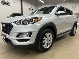 <p>Perfect example of a low km, very clean Tucson - this sharp Silver on Black SUV is great on gas and has room for 5 - Heated Seats, Back-up Camera, Cruise, SiriusXM Radio, Bluetooth, and ready to go!</p><p>All Vehicles are Sold Certified and come with a 3 month/3,000 km 1-Star Powertrain Drive Global Warranty (extended warranties and coverages available). </p><p>At LuckyDog we believe in transparency, thats why all our vehicles come with a complete CarFax Vehicle report to ensure your not buying a salvaged or rebuilt vehicle. </p><p>* While every reasonable effort is made to ensure the accuracy of this information, some vehicle information may not be exactly as shown. </p>