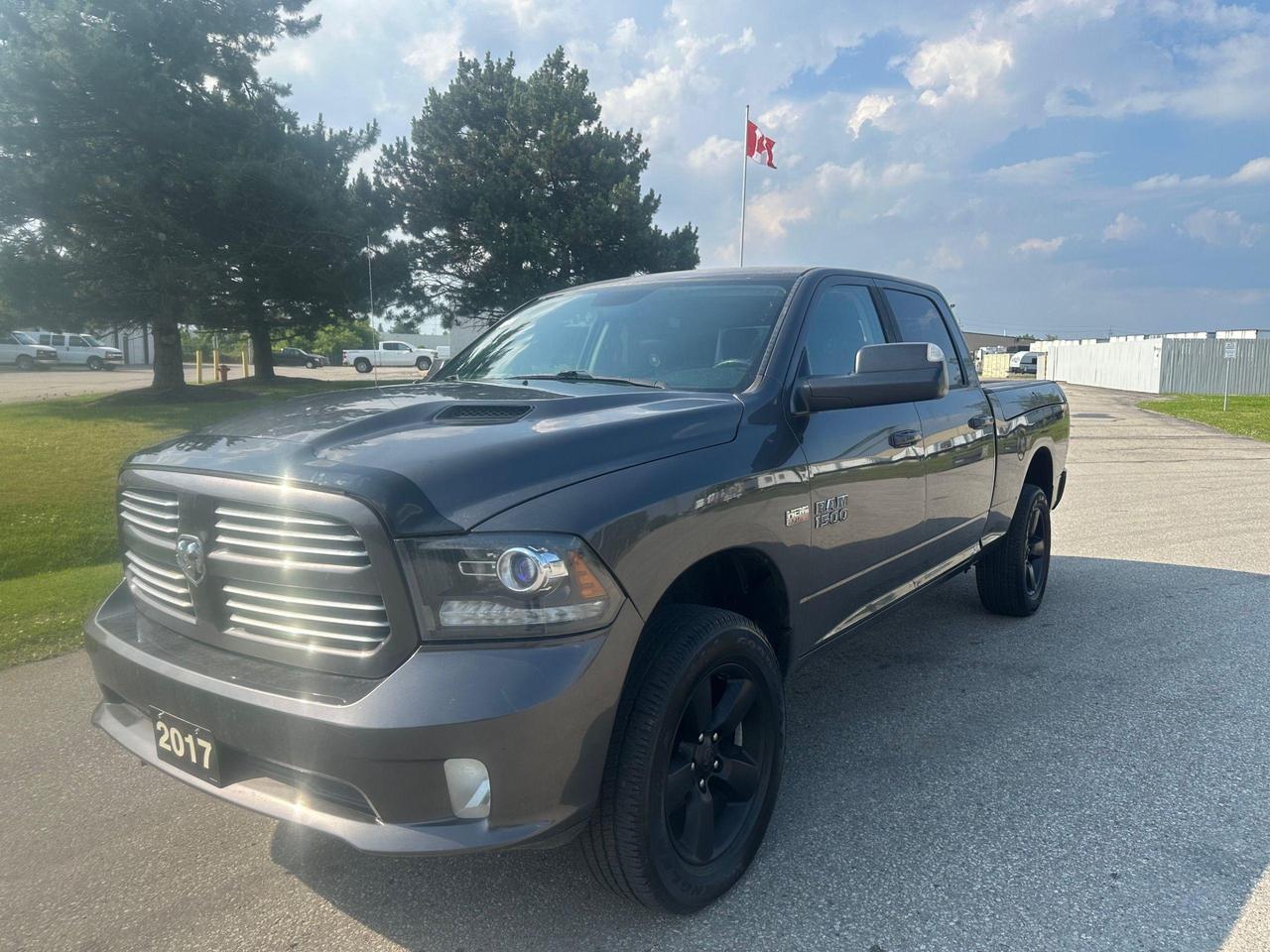 2017 RAM 1500 4WD CREW CAB 149" SPORT - Photo #1