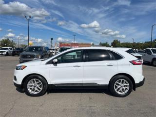 Check out the large selection of pre-owned vehicles at Tisdales today!<br> <br>   With luxury inside, and a bold, distinct style outside, the Ford Edge will stand out in the crowd as much as you do. This  2021 Ford Edge is fresh on our lot in Kindersley. <br> <br>With impressive attention to detail, the Ford Edge seamlessly integrates power, performance and handling with awesome technology to help you multitask your way through the challenges that life throws your way. Made for an active lifestyle and spontaneous getaways, the Ford Edge is as rough and tumble as you are. Push the boundaries and stay connected to the road with this sweet ride!This  SUV has 45,370 kms. Its  white in colour  . It has an automatic transmission and is powered by a  250HP 2.0L 4 Cylinder Engine.  This unit has some remaining factory warranty for added peace of mind. <br> To view the original window sticker for this vehicle view this <a href=http://www.windowsticker.forddirect.com/windowsticker.pdf?vin=2FMPK4J92MBA05102 target=_blank>http://www.windowsticker.forddirect.com/windowsticker.pdf?vin=2FMPK4J92MBA05102</a>. <br/><br> <br>To apply right now for financing use this link : <a href=http://www.tisdales.com/shopping-tools/apply-for-credit.html target=_blank>http://www.tisdales.com/shopping-tools/apply-for-credit.html</a><br><br> <br/><br>Tisdales is not your standard dealership. Sales consultants are available to discuss what vehicle would best suit the customer and their lifestyle, and if a certain vehicle isnt readily available on the lot, one will be brought in.<br> Come by and check out our fleet of 20+ used cars and trucks and 70+ new cars and trucks for sale in Kindersley.  o~o