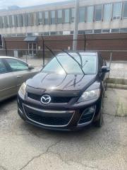 *AS IS*  <br><br>2010 MAZDA CX-7<br><br>RUNS, NEEDS ENGINE.<br><br>Please Note: HST and Licensing is an additional fee separate from the advertised price. <br>  <br>Certain Crypto-Currency accepted as payment, Charges will apply.<br><br>This vehicle is being sold as is, unfit and is not represented as being in road worthy condition, mechanically sound or maintained at any guaranteed level of quality. The vehicle may not be fit for use as a means of transportation and may require substantial repairs at the purchasers expense. It may not be possible to register the vehicle to be driven in its current condition.