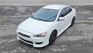 <p style=line-height: 108%; margin-bottom: 0.28cm;><span style=color: #000000;>2013 Mitsubishi Lancer SE, 4 cylinder 2.0L engine with automatic transmission. Black cloth heated seats, power doors and power windows, power mirrors and cruise control, Bluetooth connectivity, and alloy wheels. 235k KM. Asking $4,995. <strong>Rebuilt Title</strong></span></p>