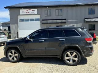 Used 2014 Jeep Grand Cherokee Limited  6 cyl AWD SUV with every option -include winter tires on custom rims for sale in West Saint Paul, MB