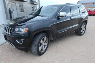 Used 2014 Jeep Grand Cherokee Limited  6 cyl AWD SUV with every option -include winter tires on custom rims for sale in West Saint Paul, MB