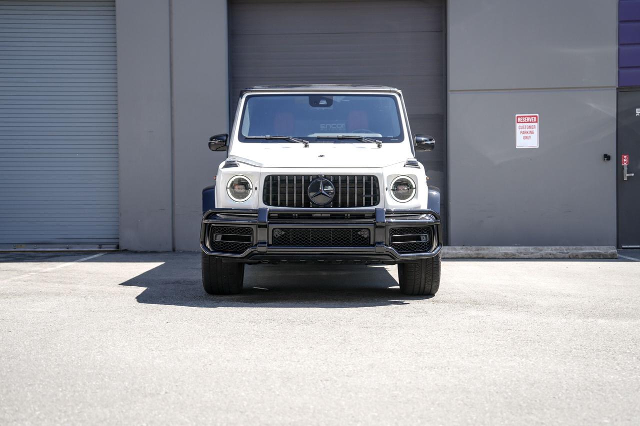 <p><span style=font-size: 12pt;>2021 Mercedes Benz G63&nbsp;</span></p><p><span style=font-size: 12pt;>Accident Free&nbsp;</span></p><p><span style=font-size: 12pt;>Balance of factory warranty&nbsp;</span></p><p><span style=font-size: 12pt;>Polar White&nbsp;</span></p><p><span style=font-family: MBCorpoS, Arial, sans-serif; font-size: 12pt; background-color: #ffffff;>Roof in Obsidian Black metallic</span></p><p><span style=font-size: 12pt;><span style=font-family: MBCorpoS, Arial, sans-serif; background-color: #ffffff;>AMG Night Package</span></span></p><p><span style=font-size: 12pt;><span style=font-family: MBCorpoS, Arial, sans-serif; background-color: #ffffff;>AMG Stealth Package</span></span></p><p><span style=font-size: 12pt;><span style=font-family: MBCorpoS, Arial, sans-serif; background-color: #ffffff;>AMG brush guard in Obsidian Black</span></span></p><p><span style=font-family: MBCorpoS, Arial, sans-serif; font-size: 12pt; background-color: #ffffff;>22 AMG Cross-Spoke Forged Wheels - Matte Black&nbsp;</span></p><p><span style=font-size: 12pt;><span style=font-family: MBCorpoS, Arial, sans-serif;><span style=background-color: #ffffff;>Exclusive Package&nbsp;</span></span></span></p><p><span style=font-size: 12pt;><span style=font-family: MBCorpoS, Arial, sans-serif;><span style=background-color: #ffffff;>Classic Red/Black Exclusive Nappa Leather / Diamond stitching&nbsp;</span></span></span></p><p><span style=font-size: 12pt;><span style=font-family: MBCorpoS, Arial, sans-serif;><span style=background-color: #ffffff;>AMG Carbon Package&nbsp;</span></span></span></p><p><span style=font-size: 12pt;><span style=font-family: MBCorpoS, Arial, sans-serif;><span style=background-color: #ffffff;>AMG Carbon Fiber Steering Wheel / Heating&nbsp;</span></span></span></p><p><span style=font-size: 12pt;>Carfax available upon request</span></p><p>&nbsp;</p><div><span style=font-size: 12pt;>*Note some cars are kept at offsite storage facility. Please make an appointment with us before visiting.</span></div><div><br /><p><span style=font-size: 12pt;>Price listed before government tax and dealership doc fee $595&nbsp;</span></p><br /><p><span style=font-size: 12pt;>Financing and Leasing available on OAC (Subject to finance & lease fee charges)</span></p><br /><p><span style=font-size: 12pt;>Dealer 50009&nbsp;</span></p><br /><p><span style=font-size: 12pt;>www.encoreautogroup.ca</span></p><br /><p><span style=font-size: 12pt;>604.861.8975</span></p><p><span style=font-size: 12pt;>&nbsp;</span></p></div><p>&nbsp;</p>