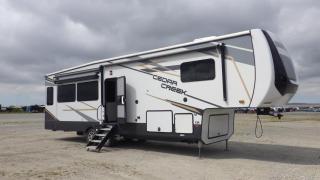 Used 2021 Forest River Cedar Creek 38 Foot 5th Wheel Travel Trailer with 3 Slides for sale in Burnaby, BC