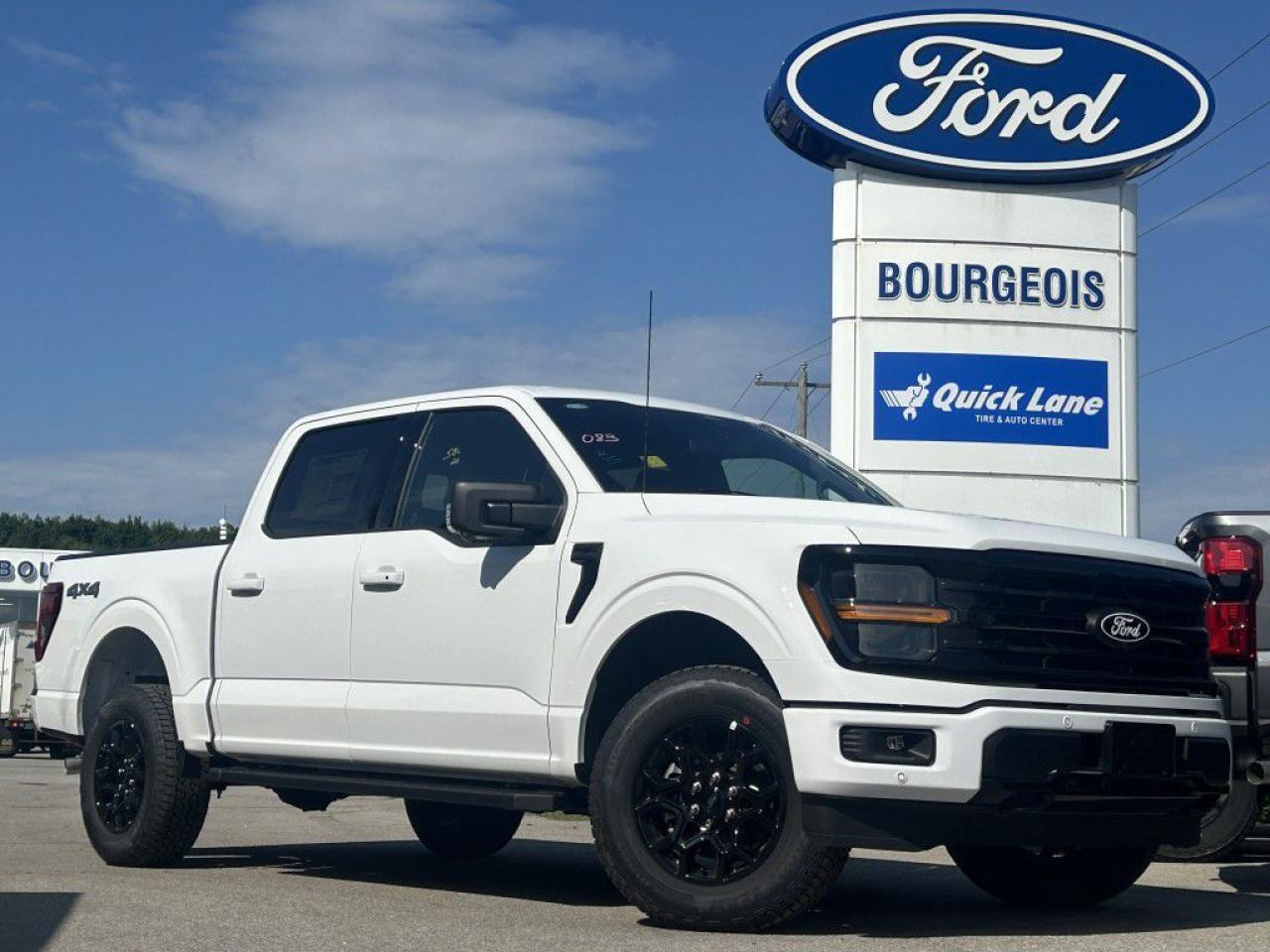 <p>Step into power and performance with the new Ford F-150 XLT 4WD SuperCrew, a dazzling white truck designed to conquer roads and rough terrains alike. With its 4×4 drivetrain, it's engineered for those who demand strength and versatility in their ride, ensuring exceptional handling in any condition.</p><p>This Ford F-150 XLT doesn't just lead with its muscular 3.5L 6-cylinder engine; it also boasts an impressive body that blends functionality with style. The truck's exterior, dressed in pristine white, complements its spacious interior, which is smartly upholstered in black. It's not just about looks; it also offers a range of features such as heated mirrors, a leatherette steering wheel, and running boards for ease of access, encapsulating the perfect blend of ruggedness and refinement.</p><p>Technology aficionados will be drawn to the F-150 XLT's cutting-edge suite of features. An automatic transmission effortlessly manages the engine's power, while the truck's interior brims with innovations such as a navigation system, backup camera, and Bluetooth connection, enhancing both convenience and safety. Lane assist, parking sensors, and brake assist elevate your driving experience, making every journey safer and more enjoyable. The inclusion of a Wi-Fi hotspot and smart device integration ensures you're always connected, no matter where your adventures take you.</p><p>Perfect for the modern adventurer or the hardworking professional who appreciates power, advanced technology, and striking design, this Ford F-150 XLT 4WD SuperCrew stands ready to meet the demands of a wide array of buyers. We invite you to contact our dealership today for more information and to experience firsthand the unparalleled capabilities of this exceptional vehicle.</p> <p><span style=color:rgb( 58 , 80 , 95 )>The discount shown on vehicle represents the </span><u>Cash Purchase</u><span style=color:rgb( 58 , 80 , 95 )> discount and is inclusive of all non-stackable and stackable cash purchase discounts from Ford of Canada and Bourgeois Ford North and is offered in lieu of sub-vented lease or finance rates. To get details on current discounts applicable to this and other vehicles in our inventory for Lease and Finance customer, see a member of our team. All offers for lease or finance are On Approved Credit (OAC).While every effort is made to ensure the accuracy of discounts and programs, programs are subject to change without notice </span><span style=color:rgb( 119 , 119 , 119 )>and may not be accurate or completely current. While every reasonable effort is made to ensure the accuracy of this data, we are not responsible for any errors or omissions contained on these pages.</span></p> <p><strong>Financing Your Next Vehicle with Bourgeois Motors Ford in Midland:</strong></p><p>At Bourgeois Motors Ford, we make financing your next vehicle simple and stress-free! Our team works with trusted lenders to find flexible options tailored to your budget. Drive away with confidenceapply today!</p><p>Take advantage of our online pre-qualification tool, backed by Equifax and TD Bank to find the payment that works for you. Simply <a href=https://www.bourgeoismotors.com/free-credit-check/ rel=nofollow><strong>CLICK HERE</strong></a><strong> </strong>to use our secure online credit tool with no impact to your credit.</p> <p>Experience exceptional value with Bourgeois Motors Fords executive demos. These are like-new vehicles with low mileage, premium features, and significant savings. Drive away with confidence, backed by the balance of factory warranties and our commitment to quality. Its a great way to own a new Ford.</p>