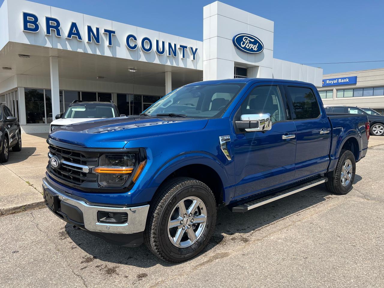 <p>KEY FEATURES: 2024 F150 XLT, 4x4, Crew Cab, 2.7L v6 ecoboost Engine, Blue, Dark Slate Cloth interior, 10-speed automatic transmission, 302a Xlt/Chrome Package, trailer hitch, 18 inch aluminum wheels, SYNC4, 12 screen, Ford pass, Lane keep system, pre-collision braking, pre-collision assist, rear backup camera, keyless entry, power windows , power locks and more.</p><p><br />Please Call 519-756-6191, Email sales@brantcountyford.ca for more information and availability on this vehicle.  Brant County Ford is a family owned dealership and has been a proud member of the Brantford community for over 40 years!</p><p> </p><p><br />** PURCHASE PRICE ONLY (Includes) Fords Delivery Allowance</p><p><br />** See dealer for details.</p><p>*Please note all prices are plus HST and Licencing. </p><p>* Prices in Ontario, Alberta and British Columbia include OMVIC/AMVIC fee (where applicable), accessories, other dealer installed options, administration and other retailer charges. </p><p>*The sale price assumes all applicable rebates and incentives (Delivery Allowance/Non-Stackable Cash/3-Payment rebate/SUV Bonus/Winter Bonus, Safety etc</p><p> </p>