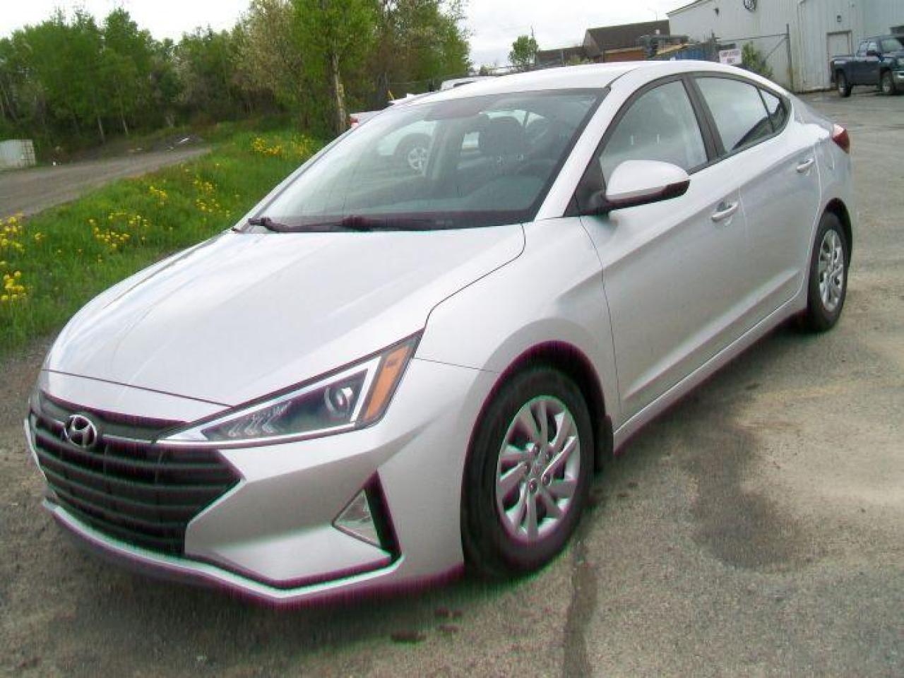 <p>Looking for a reliable and affordable sedan? Look no further than this 2019 Hyundai Elantra Essential Manual, available now at Canadian Auto Sales NL. This silver beauty boasts a sleek design and a spacious interior, perfect for everyday commutes and weekend adventures. With its peppy 2L 4-cylinder engine and smooth manual transmission, this Elantra offers a fun and engaging driving experience. This well-maintained vehicle has only 77,618km on the odometer, ensuring plenty of life left in it.</p><p>Step inside and enjoy the comfort of black cloth bucket seats, power windows, and a tilt steering wheel that lets you find the perfect driving position. Stay connected with Bluetooth connectivity for hands-free calling and music streaming. Stay safe with features like anti-lock brakes, traction control, and multiple airbags.</p><p>Here are five features that make this Elantra a standout:</p><ul><li><strong>Manual Transmission:</strong> Experience the thrill of a smooth and responsive manual transmission, giving you complete control over the driving experience.</li><li><strong>Bluetooth Connectivity:</strong> Stay connected with hands-free calling and music streaming while on the road.</li><li><strong>Heated Mirrors:</strong> Enjoy clear visibility in any weather conditions with heated side mirrors.</li><li><strong>Power Windows and Locks:</strong> Enjoy the convenience of power windows and locks for effortless operation.</li><li><strong>Safety Features:</strong> Be assured with features like anti-lock brakes, traction control, and multiple airbags.</li></ul><p>Visit Canadian Auto Sales NL today for a test drive and experience the practicality and style of this 2019 Hyundai Elantra Essential Manual.</p>