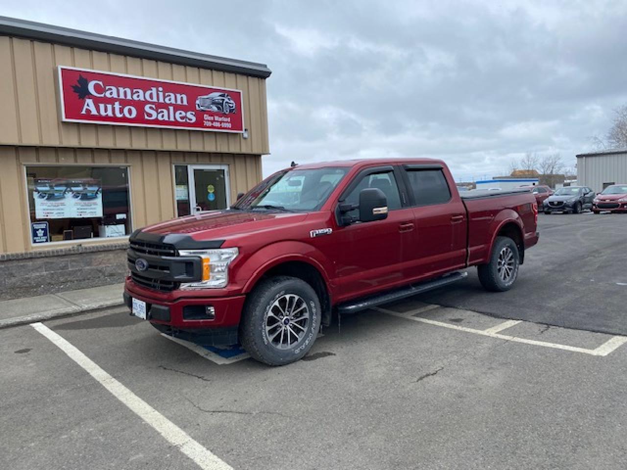 <p>Get ready to conquer any terrain with this powerful and stylish 2019 Ford F-150 XLT, now available at Canadian Auto Sales NL. This stunning Maroon pickup truck boasts a sleek exterior and a comfortable black interior. The 3.5L 6-cylinder engine provides ample power, while the 4-wheel drive system ensures you can handle any weather condition. With a mere 68,287km on the odometer, this F-150 is ready for many more adventures.</p><p>Step inside and enjoy the comfort of power seats, a tilt steering wheel, and a security system for peace of mind. Stay connected with the CD player, and control your music and other functions with the convenient steering wheel controls. This F-150 is equipped with a tonneau cover to protect your cargo and features remote start for those chilly Canadian mornings.</p><p><strong>Here are 5 of the F-150 XLTs most sizzling features:</strong></p><ul><li><strong>Powerful 3.5L 6-cylinder engine</strong> for effortless performance.</li><li><strong>4-wheel drive</strong> for conquering any terrain and weather condition.</li><li><strong>Tonneau cover</strong> to protect your cargo and keep it secure.</li><li><strong>Remote start</strong> for convenient and comfortable driving.</li><li><strong>Power seats</strong> for maximum comfort on long drives.</li></ul><p>Visit Canadian Auto Sales NL today for a test drive and experience this incredible F-150 firsthand.</p>