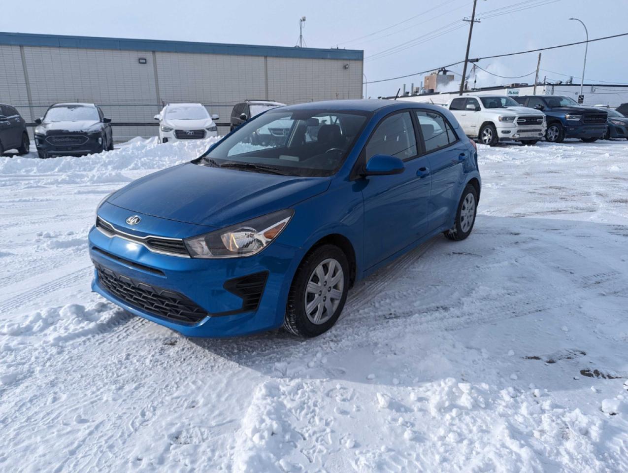 <p> </p>
<p>Introducing the 2021 Kia Rio5, a compact hatchback that excels in efficiency, reliability, and convenience. With low kilometers, this vehicle offers a nearly-new driving experience, ensuring many miles of reliable transportation ahead. One of its standout features is its exceptional gas mileage, making it perfect for city commutes and long-distance travels alike. Whether youre navigating busy urban streets or embarking on weekend getaways, the Kia Rio5 delivers impressive fuel efficiency to keep you on the road longer without frequent stops at the pump.</p>
<p>Rest assured, this Rio5 comes fully inspected and boasts a clean Carfax report, providing peace of mind and confidence in its condition and history. Additionally, with financing options available, owning this reliable and fuel-efficient hatchback is more accessible than ever. Plus, take advantage of our convenient delivery service to have the 2021 Kia Rio5 brought straight to your doorstep. Dont miss out on the opportunity to experience the perfect combination of efficiency, reliability, and convenience – schedule your test drive today and elevate your driving experience with the 2021 Kia Rio5.</p>