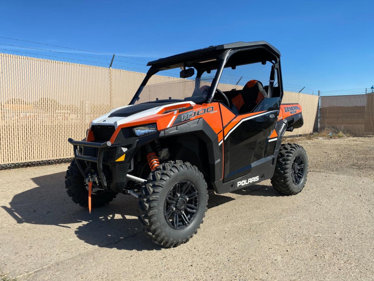 <p>The 2016 Polaris General 1000 is a versatile and high-performance side-by-side (SxS) vehicle designed for off-road enthusiasts. It is powered by a potent 1000cc ProStar engine, providing impressive acceleration and top speed. The General 1000 offers a comfortable and spacious cabin with seating for two, equipped with premium amenities like adjustable seats and a digital display. Its dual-purpose design allows it to excel in both work and play, with a sturdy cargo bed and impressive towing capacity. With its advanced suspension system, robust construction, and off-road capabilities, the 2016 Polaris General 1000 is a top choice for those seeking adventure and utility in a single SxS package.</p>