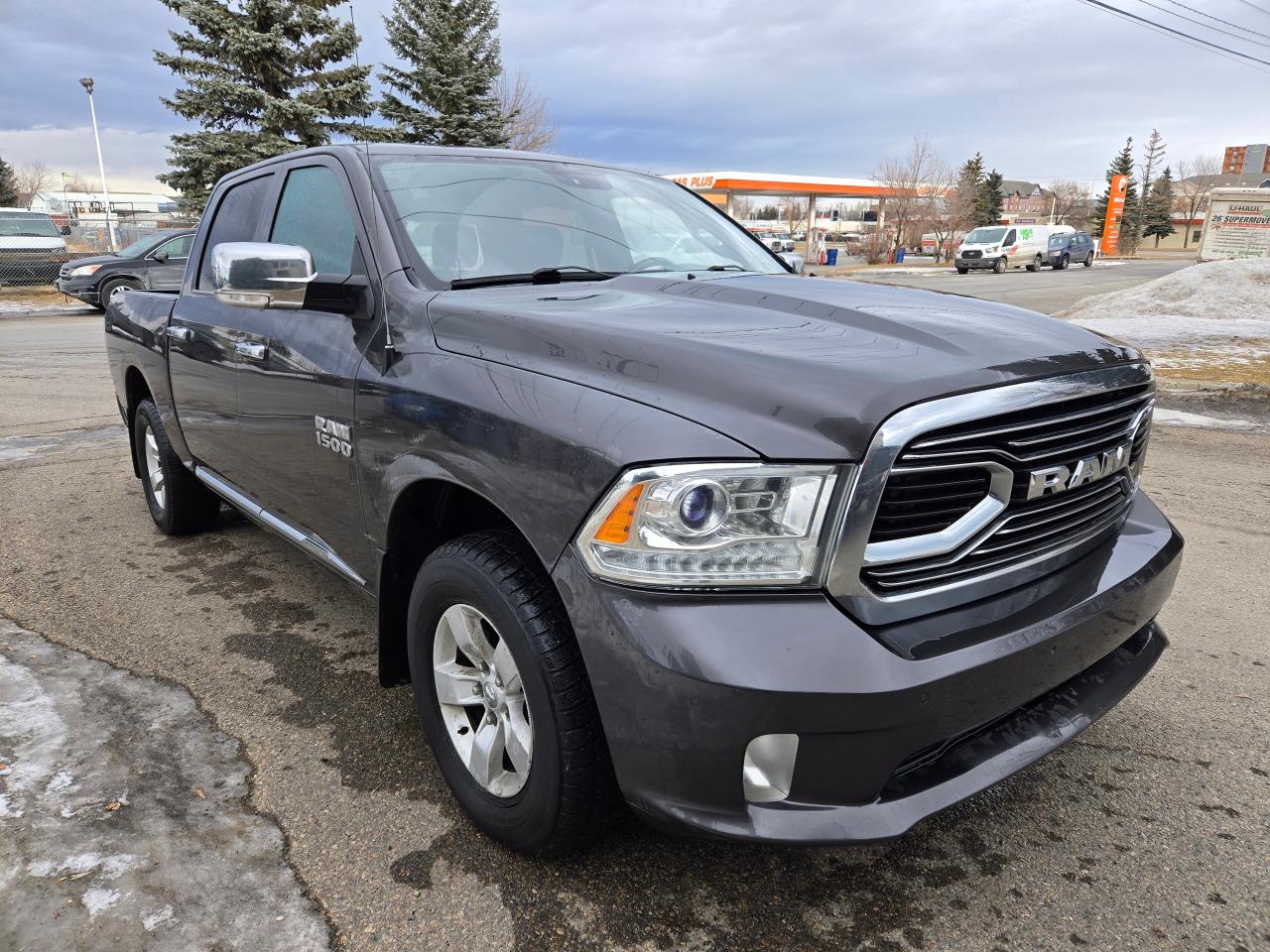 Used 2016 RAM 1500 4WD CREW CAB LIMITED | ALL CREDIT ACCEPTED!! for sale in Airdrie, AB