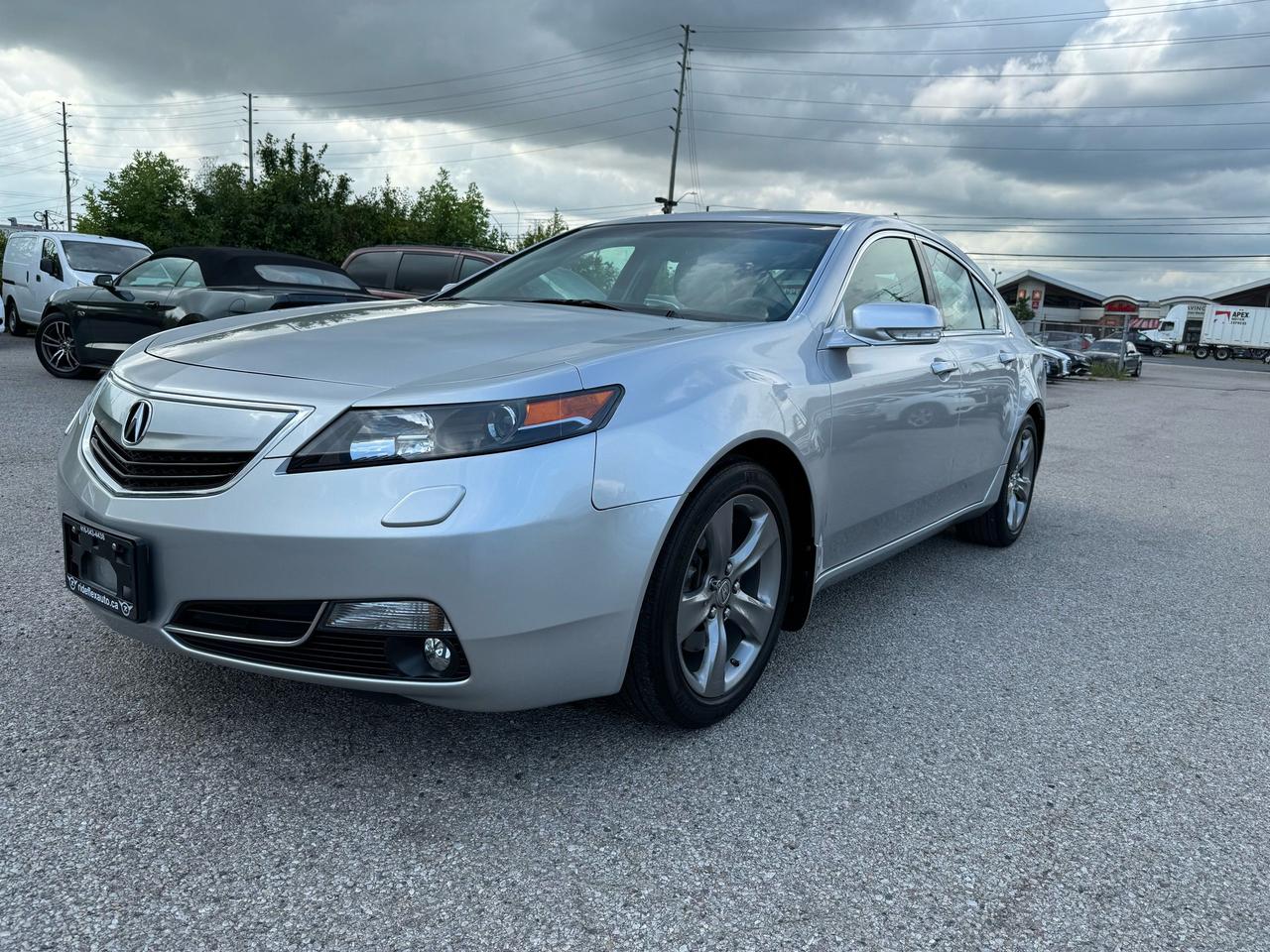 <div>2013 Acura TL TECH Package AWD comes in excellent condition,,,,,,CLEAN CARFAX REPORT,,,,LOW KILOMETRES,,,,runs & drives like brand new, equipped with Navigation System, Backup Camera, Leather Interior, power seats, heated seats, Power Sunroof, heated mirrors, blind spot mirrors, Bluetooth, cruise control & much more....fully certified included in the price, HST & Licensing extra, this vehicle has been serviced in 2014, 2015, 2016, & up to recent in Acura Store...Service Records available upon request...Financing is available with the lowest interest rates and affordable monthly payments............Please contact us @ 416-543-4438 for more details....At Rideflex Auto we are serving our clients across G.T.A, Toronto, Vaughan, Richmond Hill, Newmarket, Bradford, Markham, Mississauga, Scarborough, Pickering, Ajax, Oakville, Hamilton, Brampton, Waterloo, Burlington, Aurora, Milton, Whitby, Kitchener London, Brantford, Barrie, Milton.......</div><div>Buy with confidence from Rideflex Auto...</div>