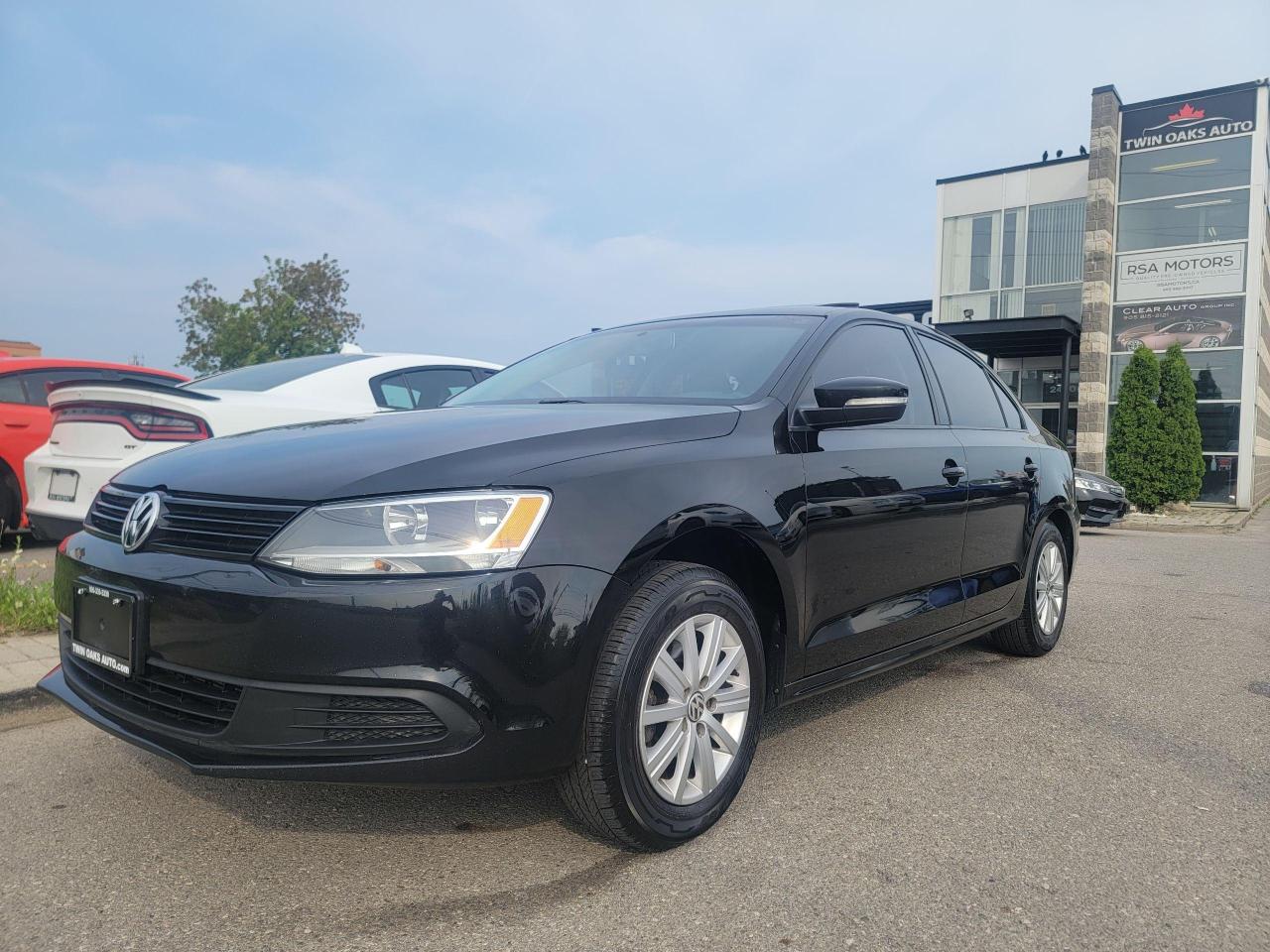 <p>SHARP 2014 VW JETTA! SUPER CLEAN! BLACK ON BLACK w SUNROOF & HEATED SEATS. LOCAL ONTARIO! DRIVES GREAT!! CALL TODAY!!</p><p> </p><p>THE FULL CERTIFICATION COST OF THIS VEICHLE IS AN <strong>ADDITIONAL $690+HST</strong>. THE VEHICLE WILL COME WITH A FULL VAILD SAFETY AND 36 DAY SAFETY ITEM WARRANTY. THE OIL WILL BE CHANGED, ALL FLUIDS TOPPED UP AND FRESHLY DETAILED. WE AT TWIN OAKS AUTO STRIVE TO PROVIDE YOU A HASSLE FREE CAR BUYING EXPERIENCE! WELL HAVE YOU DOWN THE ROAD QUICKLY!!! </p><p><strong>Financing Options Available!</strong></p><p><strong>TO CALL US 905-339-3330 </strong></p><p>We are located @ 2470 ROYAL WINDSOR DRIVE (BETWEEN FORD DR AND WINSTON CHURCHILL) OAKVILLE, ONTARIO L6J 7Y2</p><p>PLEASE SEE OUR MAIN WEBSITE FOR MORE PICTURES AND CARFAX REPORTS</p><p><span style=font-size: 18pt;>TwinOaksAuto.Com</span></p>