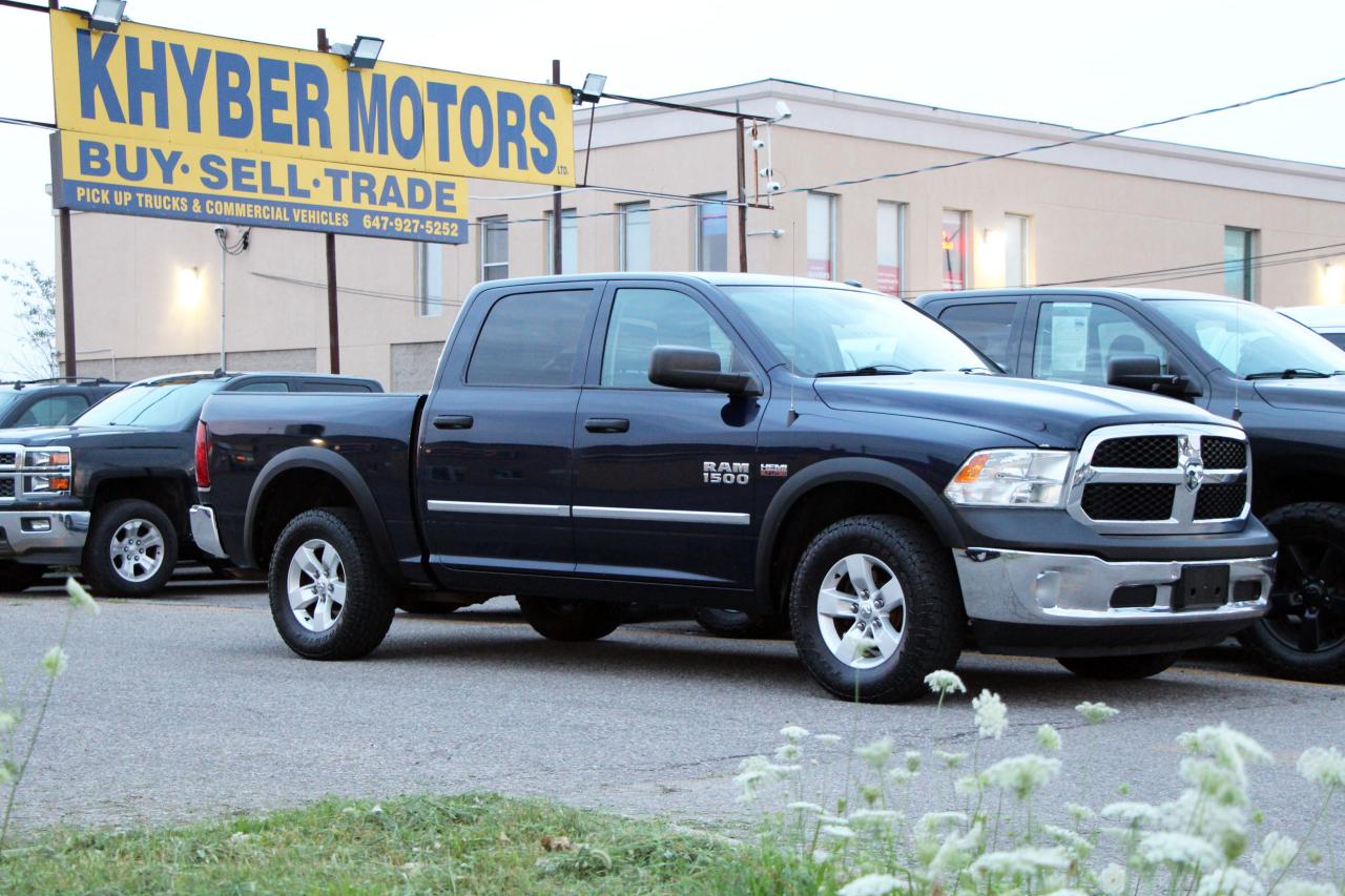 Used 2015 RAM 1500 4WD Crew Cab 140.5