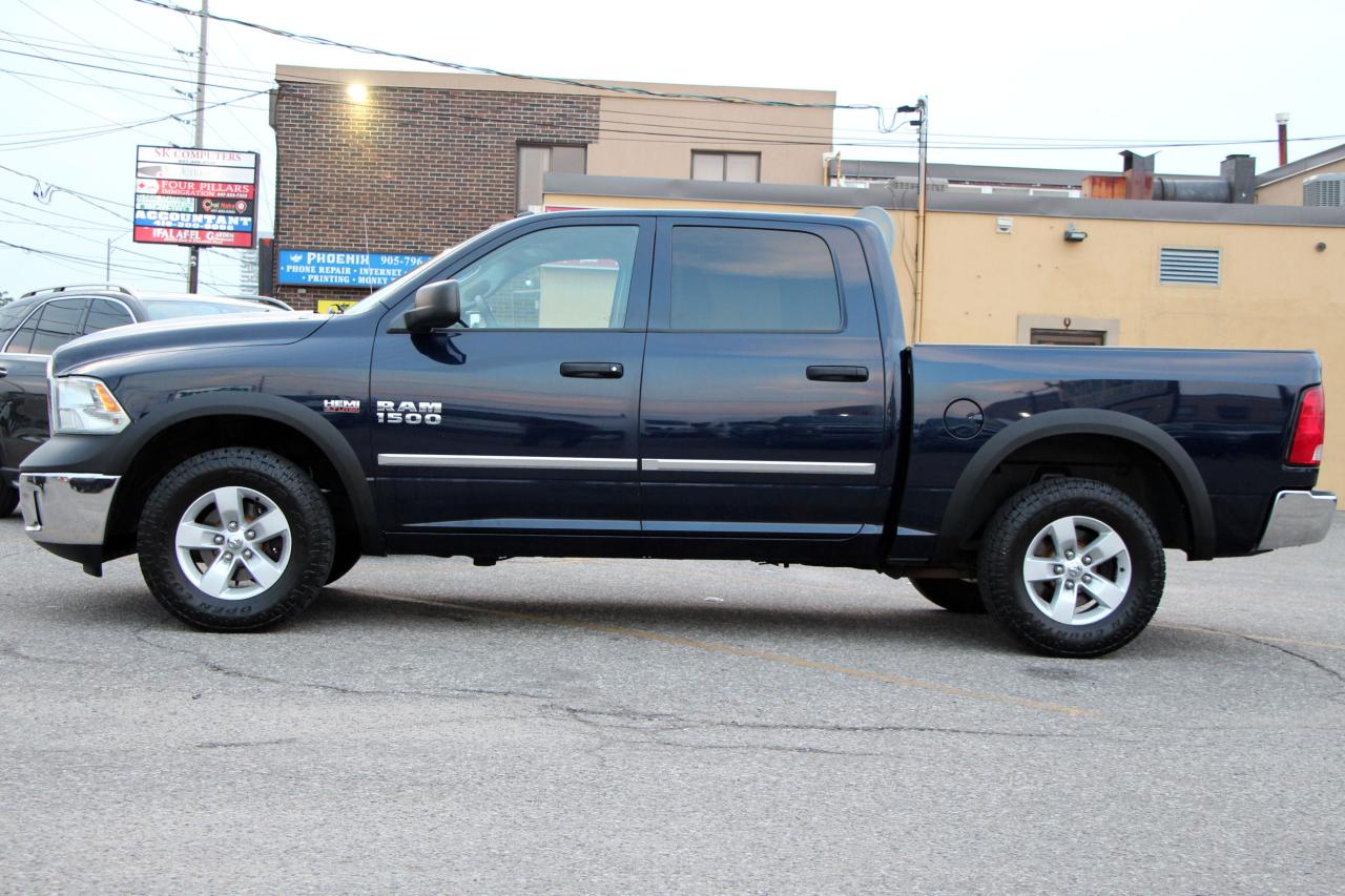 2015 RAM 1500 4WD Crew Cab 140.5" ST - Photo #3