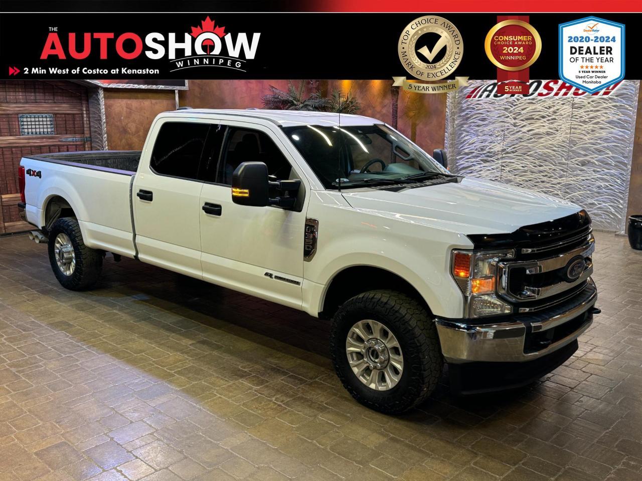 <strong>*** OXFORD WHITE SUPER DUTY CREW CAB SRW F-350 XLT *** 8 INCH TOUCHSCREEN, REAR VIEW CAMERA, APPLE CARPLAY & ANDROID AUTO ***</strong> The 2022 Ford Super Duty F-350 SRW XLT Crew Cab stands as a formidable option in the heavy-duty truck market, catering to drivers who demand exceptional performance, advanced technology, and robust capability. With a blend of powerful engines, advanced features, and a rugged design, the F-350 XLT is engineered to tackle the toughest tasks while offering a comfortable and modern driving experience. Step into the F-350 XLT and experience features such as an<strong> 8.0 INCH TOUCHSCREEN</strong>......SYNC 3......<strong>APPLE CARPLAY</strong>......<strong>ANDROID AUTO</strong>.....SiriusXM......AM/FM Radio......Bluetooth......Steering Wheel w/ Media & <strong>CRUISE CONTROL</strong>......<strong>REAR VIEW CAMERA</strong>......Dynamic Hitch Assist......<strong>ADVANCETRAC</strong>......<strong>ROLL STABILITY CONTROL</strong>......SOS-Post-Crash Alert System......SecuriLock Passive Anti-Theft System......Hill Start Assist......<strong>STATIONARY ELEVATED IDLE CONTROL</strong>......Trailer Brake Controller w/Smart Trailer Tow Connector......Trailer Sway Control......Automatic On/Off Headlamps......Auto high Beam......Front Stabilizer Bar......<strong>HEAVY-DUTY GAS SHOCK ABSORBERS</strong>......<strong>TWIN-I-BEAM COIL SPRING FRONT SUSPENSION</strong>......Configurable Daytime Running Lamps......Front Tow Hooks......Led Roof Maker/Clearance Lamps......Center High-Mounted Stop Lamp w/Cargo Lamp......<strong>PRE-COLLISION ASSIST</strong>......<strong>AUTOMATIC EMERGENCY BRAKING</strong>......<strong>BLIND SPOT INFORMATION SYSTEM</strong>......Trailer Monitor Alert......Cross-Traffic Alert......<strong>HYDRAULIC POWER-ASSISTED STEERING</strong>......Variable-Intermittent Windshield Wipers w/Washers......Driver & Front-Passenger Airbags......Front-Seat Side Airbags......Safety Canopy System w/Side-Curtain Airbags & Rollover Sensor......Digital Vehicle Information Centre......<strong>TRAILER HITCH RECEIVER</strong>......Chrome Grille & Bumpers......Quad-Beam Jewel-Effect Halogen Headlamps......40/20/40 Split Front Bench Seat......60/40 Split Flip-Up Rear Seat......Cloth Front & Rear Seating......<strong>REMOTE KEYLESS ENTRY SYSTEM</strong>......Power Door & Tailgate Locks......Power Windows w/Front One-Touch-up/Down Feature......Rear Privacy Glass......Manual Tilt/Telescoping steering Column......<strong>6.7L V8 DIESEL</strong> Engine......Automatic Transmission......<strong>18 INCH ALUMINUM WHEELS </strong>w/ <strong>COOPER DISCOVERER RUGGED TREK TIRE</strong>!! <br /><br />This heavy duty truck comes with the original Owners Manual and only <strong>62,750 KILOMETERS</strong>!! Financing and Extended Warranty available!!<br /><br /><br />Will accept trades. Please call (204)560-6287 or View at 3165 McGillivray Blvd. (Conveniently located two minutes West from Costco at corner of Kenaston and McGillivray Blvd.)<br /><br />In addition to this please view our complete inventory of used <a href=\https://www.autoshowwinnipeg.com/used-trucks-winnipeg/\>trucks</a>, used <a href=\https://www.autoshowwinnipeg.com/used-cars-winnipeg/\>SUVs</a>, used <a href=\https://www.autoshowwinnipeg.com/used-cars-winnipeg/\>Vans</a>, used <a href=\https://www.autoshowwinnipeg.com/new-used-rvs-winnipeg/\>RVs</a>, and used <a href=\https://www.autoshowwinnipeg.com/used-cars-winnipeg/\>Cars</a> in Winnipeg on our website: <a href=\https://www.autoshowwinnipeg.com/\>WWW.AUTOSHOWWINNIPEG.COM</a><br /><br />Complete comprehensive warranty is available for this vehicle. Please ask for warranty option details. All advertised prices, fees and payments plus taxes (where applicable).<br /><br />Winnipeg, MB - Manitoba Dealer Permit # 5851<p> </p>