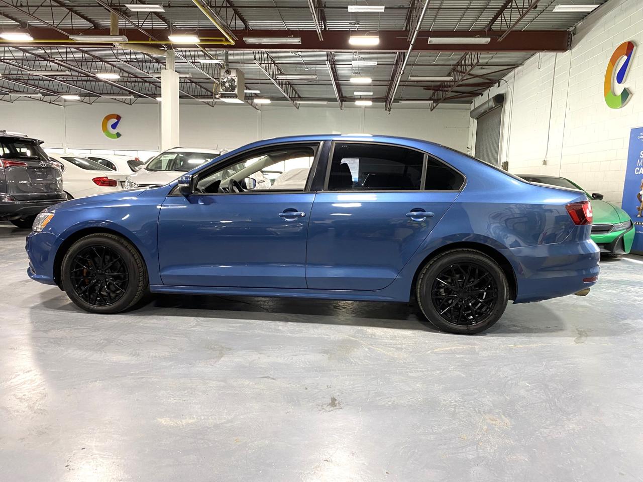 2016 Volkswagen Jetta 4dr 1.4 TSI Auto Trendline - Photo #2