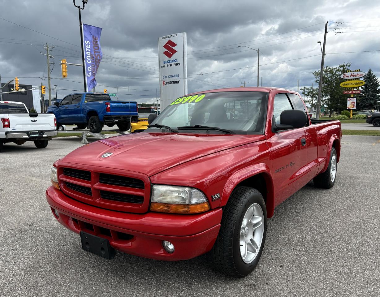 The 2000 Dodge Dakota R/T Club Cab is a true gem, boasting immaculate condition and remaining completely unmodified. With only 65,000 kilometers on the odometer, this truck is practically brand new. Its sleek design and powerful engine make it a standout in the crowd, while its spacious Club Cab offers ample room for both passengers and cargo. This truck has been meticulously maintained and is free from any errors or defects. Its a reliable and sturdy vehicle, perfect for both work and play. Dont miss out on the opportunity to own this pristine Dodge Dakota R/T and experience the thrill of driving it for yourself. Trust us, you wont be disappointed. So what are you waiting for? Come take this beauty for a test drive and see for yourself why its the ultimate choice for any truck enthusiast.

G. D. Coates - The Original Used Car Superstore!
 
  Our Financing: We have financing for everyone regardless of your history. We have been helping people rebuild their credit since 1973 and can get you approvals other dealers cant. Our credit specialists will work closely with you to get you the approval and vehicle that is right for you. Come see for yourself why were known as The Home of The Credit Rebuilders!
 
  Our Warranty: G. D. Coates Used Car Superstore offers fully insured warranty plans catered to each customers individual needs. Terms are available from 3 months to 7 years and because our customers come from all over, the coverage is valid anywhere in North America.
 
  Parts & Service: We have a large eleven bay service department that services most makes and models. Our service department also includes a cleanup department for complete detailing and free shuttle service. We service what we sell! We sell and install all makes of new and used tires. Summer, winter, performance, all-season, all-terrain and more! Dress up your new car, truck, minivan or SUV before you take delivery! We carry accessories for all makes and models from hundreds of suppliers. Trailer hitches, tonneau covers, step bars, bug guards, vent visors, chrome trim, LED light kits, performance chips, leveling kits, and more! We also carry aftermarket aluminum rims for most makes and models.
 
  Our Story: Family owned and operated since 1973, we have earned a reputation for the best selection, the best reconditioned vehicles, the best financing options and the best customer service! We are a full service dealership with a massive inventory of used cars, trucks, minivans and SUVs. Chrysler, Dodge, Jeep, Ford, Lincoln, Chevrolet, GMC, Buick, Pontiac, Saturn, Cadillac, Honda, Toyota, Kia, Hyundai, Subaru, Suzuki, Volkswagen - Weve Got Em! Come see for yourself why G. D. Coates Used Car Superstore was voted Barries Best Used Car Dealership!