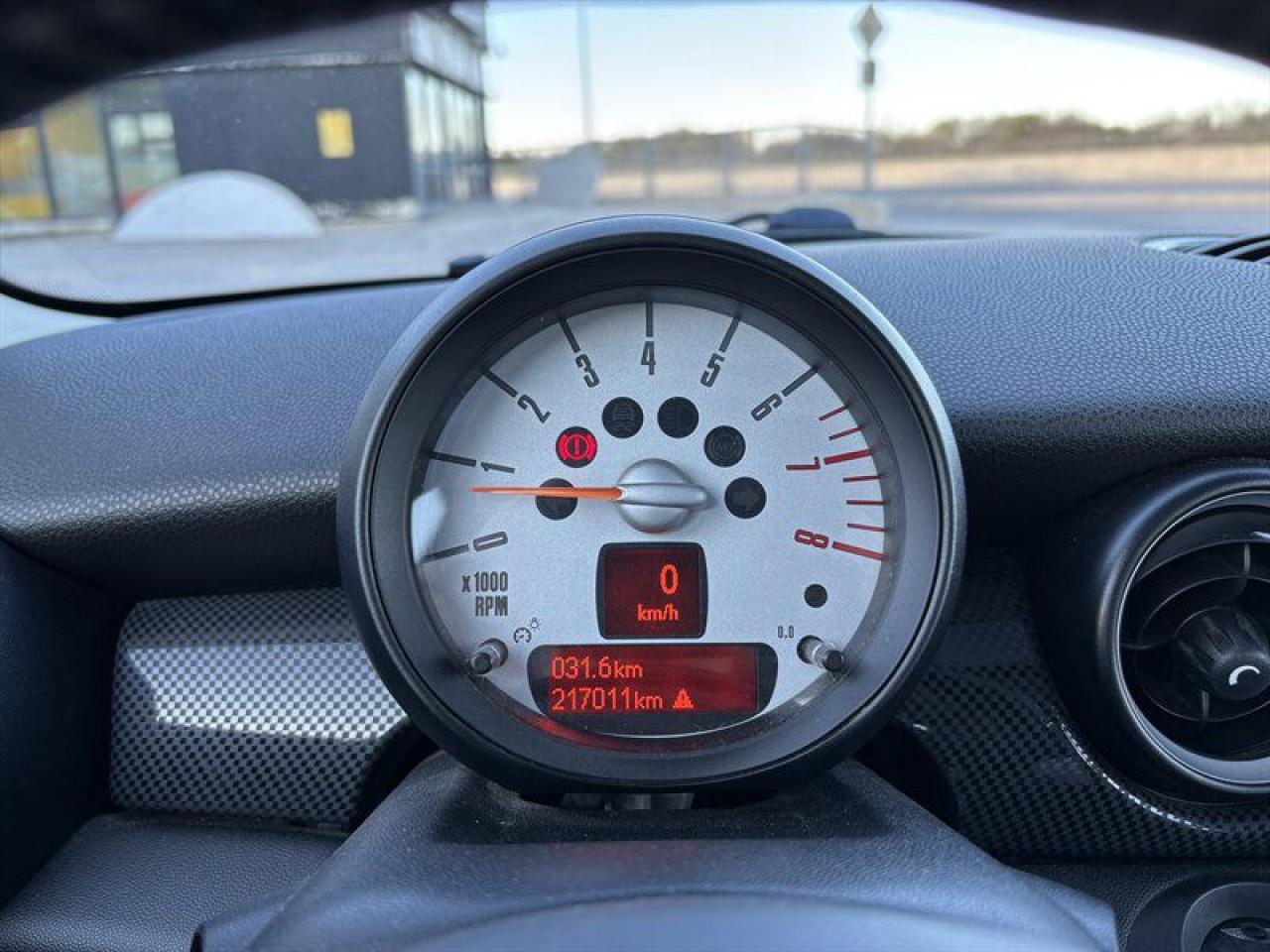 11577427