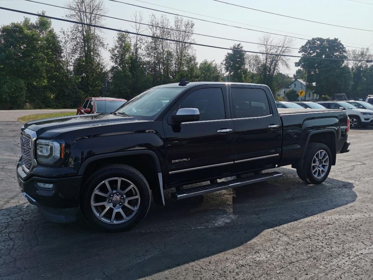 <p>LEATHER - HEATED AND COOLED SEATS - SUNROOF</p><p>Attention all truck lovers! Get ready to turn heads with this 2018 GMC Sierra 1500 Denali 4X4, now available at our dealership. This pre-owned beauty is sure to impress with its sleek design and powerful performance. Take a seat in the lap of luxury with its comfortable leather seating. And let's not forget the heart of this beast - a 6.2L V8 OHV 16V engine that will have you cruising through any terrain with ease. Don't miss your chance to own this top-of-the-line truck. Visit us at Patterson Auto Sales today!</p>