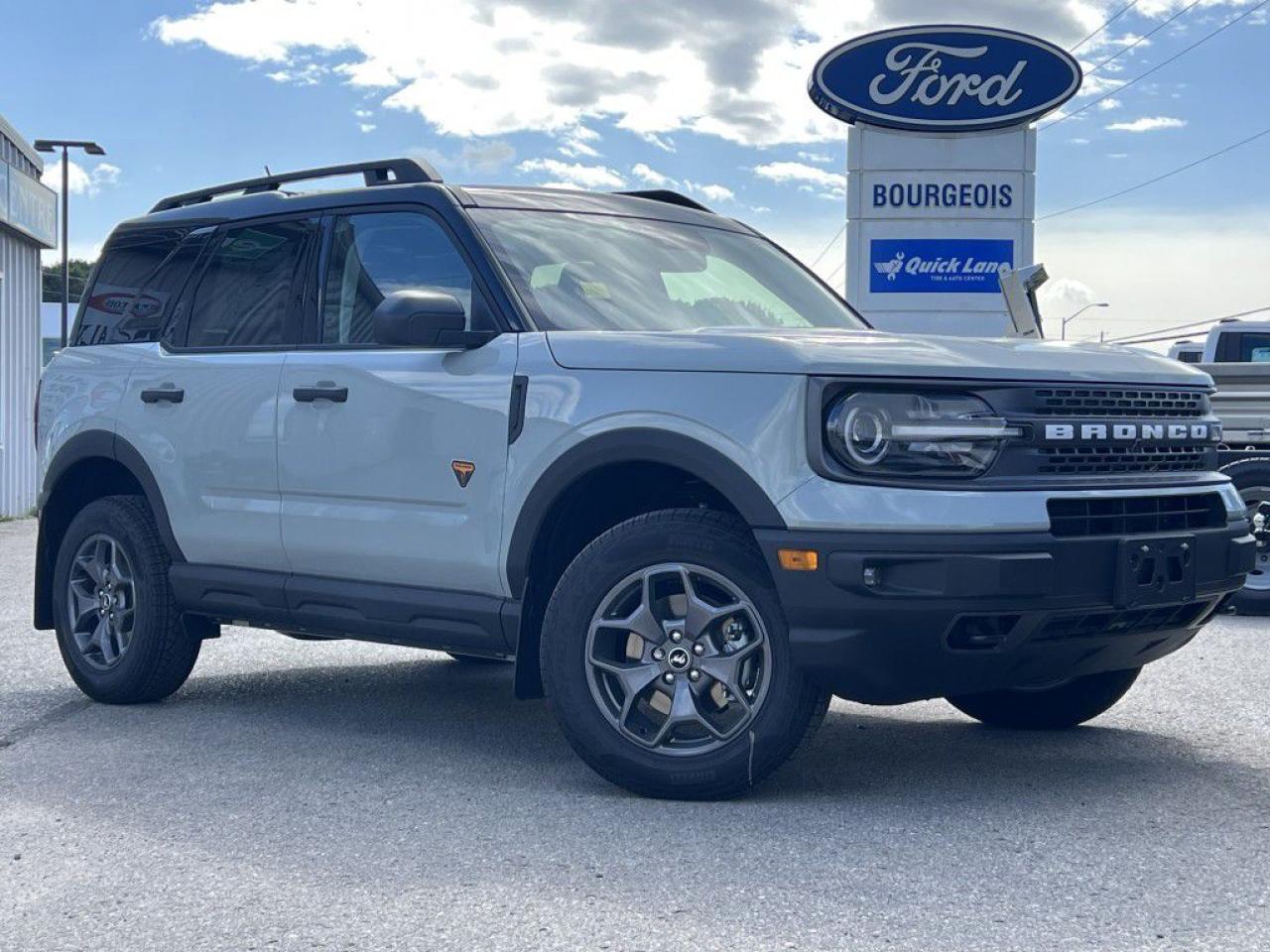 <p>Introducing the rugged and ready Ford Bronco Sport Badlands 4x4, a new off-road warrior that marries iconic design with modern functionality. Dressed in an eye-catching gray exterior, this SUV is not just about looksit's about delivering unparalleled handling and performance on any terrain, thanks to its advanced 4x4 drivetrain.</p><p>The exterior of the Bronco Sport Badlands commands attention on any road, or off it. Meanwhile, the interior is a sanctuary of comfort and style, with striking blue seats that add a vibrant contrast to its tough exterior. Its equipped with air conditioning, alloy wheels, and heated mirrors for convenience in any weather. The vehicle doesn't just cater to your comfort; it's designed to impress with features like a leatherette steering wheel and heated front seats, ensuring every journey is enjoyed in luxury.</p><p>Technology-wise, this Bronco Sport is brimming with advancements. An automatic transmission ensures seamless power delivery from the potent 2.0L 4-cyl engine, perfect for drivers who demand performance without compromise. Safety and connectivity are at the forefront, with a backup camera, Bluetooth connection, lane assist, and smart device integration. It ensures that youre always connected, secured, and assisted on your adventures. For those who value convenience, keyless entry, remote start, and power seats are just the tip of the iceberg in making your driving experience as effortless as possible.</p><p>This vehicle is perfect for adventurers who demand excellence in performance, technology, and style. Whether you're navigating the urban jungle or exploring off the beaten path, the Ford Bronco Sport Badlands 4x4 is ready to exceed your expectations. We invite you to contact our dealership for more information and experience firsthand why the Bronco Sport Badlands is the SUV of choice for discerning drivers.</p> <p><span style=color:rgb( 58 , 80 , 95 )>The discount shown on vehicle represents the </span><u>Cash Purchase</u><span style=color:rgb( 58 , 80 , 95 )> discount and is inclusive of all non-stackable and stackable cash purchase discounts from Ford of Canada and Bourgeois Ford North and is offered in lieu of sub-vented lease or finance rates. To get details on current discounts applicable to this and other vehicles in our inventory for Lease and Finance customer, see a member of our team. All offers for lease or finance are On Approved Credit (OAC).While every effort is made to ensure the accuracy of discounts and programs, programs are subject to change without notice </span><span style=color:rgb( 119 , 119 , 119 )>and may not be accurate or completely current. While every reasonable effort is made to ensure the accuracy of this data, we are not responsible for any errors or omissions contained on these pages.</span></p> <p><strong>Financing Your Next Vehicle with Bourgeois Motors Ford in Midland:</strong></p><p>At Bourgeois Motors Ford, we make financing your next vehicle simple and stress-free! Our team works with trusted lenders to find flexible options tailored to your budget. Drive away with confidenceapply today!</p><p>Take advantage of our online pre-qualification tool, backed by Equifax and TD Bank to find the payment that works for you. Simply <a href=https://www.bourgeoismotors.com/free-credit-check/ rel=nofollow><strong>CLICK HERE</strong></a><strong> </strong>to use our secure online credit tool with no impact to your credit.</p>