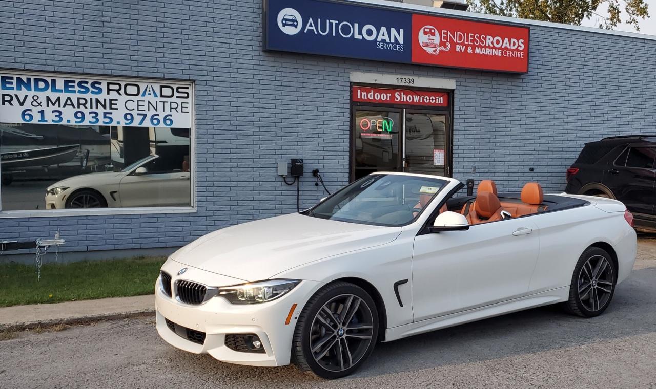 <p>Looking for a sleek and stylish ride that delivers exhilarating performance? Look no further than this 2019 BMW 4 Series, now available at Auto Loan Services. This stunning sedan, with just 37,819km on the odometer, boasts a captivating white exterior and a luxurious brown interior that exudes elegance. Beneath the hood, the powerful I6 Turbo engine provides thrilling acceleration, while the All Wheel Drive system ensures confident handling in any weather condition.</p><p>Step inside and experience a world of comfort and technology. The heated leather seats, heated steering wheel, and dual-zone climate control will keep you cozy all year round. Stay connected and entertained with features like Bluetooth, navigation, and a premium sound system. Safety is paramount, with advanced features like lane departure warning, stability control, and a suite of airbags to protect you and your passengers.</p><p>Here are five features that make this BMW 4 Series truly stand out:</p><ul><li><strong>All Wheel Drive:</strong> Experience superior handling and grip, no matter the weather conditions.</li><li><strong>Heated Leather Seats:</strong> Enjoy luxurious comfort all year round with heated, supple leather seats.</li><li><strong>Navigation System:</strong> Always stay on track with the built-in navigation system.</li><li><strong>Heated Steering Wheel:</strong> Never feel the chill again with the heated steering wheel.</li><li><strong>Lane Departure Warning:</strong> Feel safe and secure with this advanced driver assistance feature that warns you if you drift out of your lane.</li></ul><p>Dont miss this opportunity to own a stunning BMW 4 Series. Visit Auto Loan Services today and experience the driving exhilaration and luxurious comfort for yourself.</p>