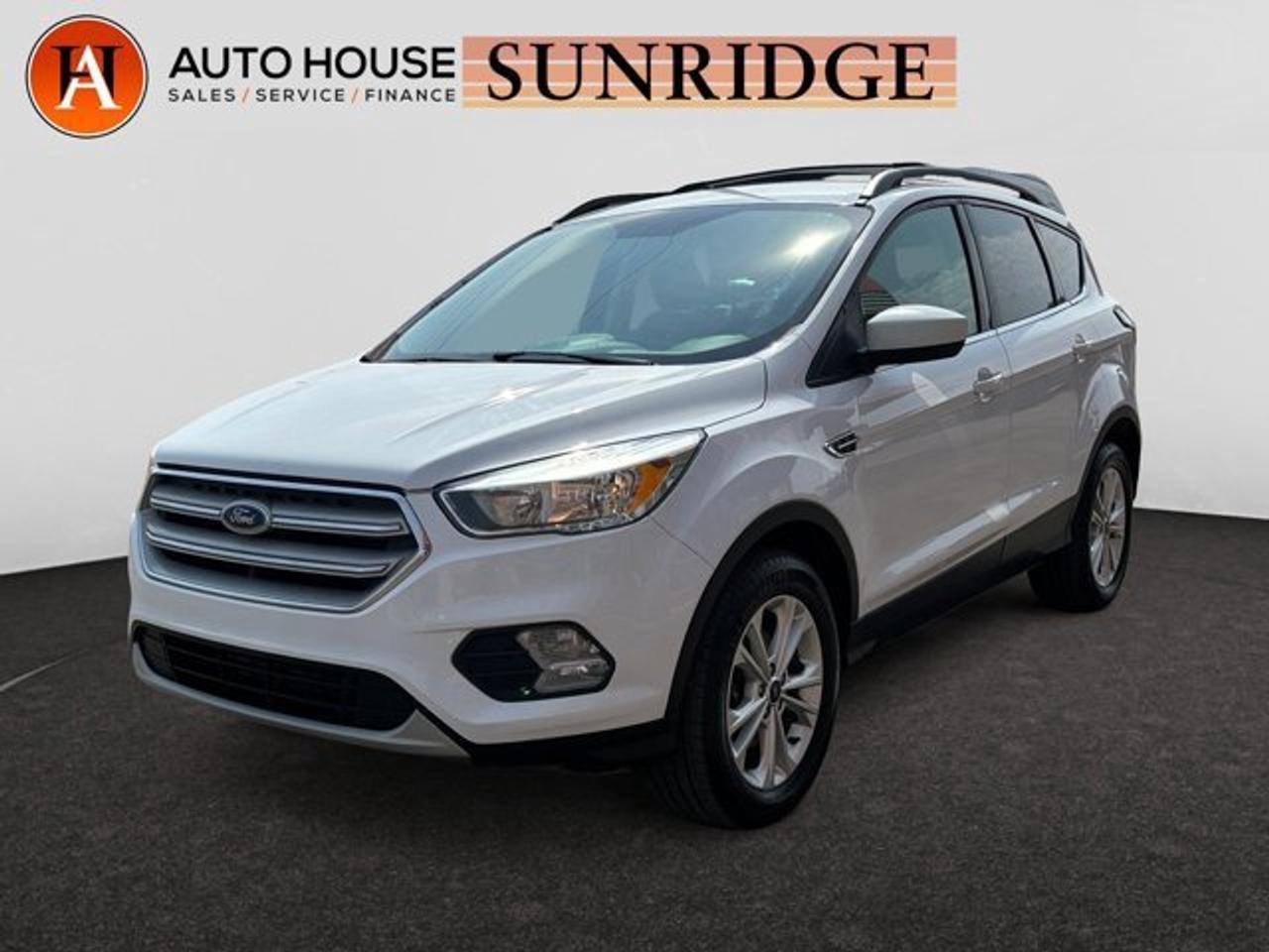 2018 FORD ESCAPE WITH 119804 KMS, BACKUP CAMERA, HEATED FRONT SEATS, AUTO STOP/START, HEATED MIRRORS, POWER WINDOW LOCKS SEATS, BLUETOOTH, USB/AUX AND MORE!.ALL CREDIT ACCEPTED!One month at a job? Bankruptcy? New to Canada? Collections? Student or work visas? Previous repossessions? Good or bad credit? Weve got you covered! Get pre-approved today at www.autoshouse.com!What We Offer:*Low Bi-Weekly Payments*Instant Approvals*Credit Consolidation*Employment Insurance*Negative Equity CoverageOperating Hours:Mon-Thurs: 10 am -- 8 pmFri-Sat: 10 am -- 6 pmCall Sunridge 403-291-0891 ! All vehicles come with a full mechanical fitness assessment and CARFAX report.Referral Program:Refer friends and family and earn $500 for each referral!AMVIC Licensed DealerAfter a credit check, we can determine payments, APR, terms, and interest rates based on your credit (O.A.C). Individual credit will affect bi-weekly payments and the total cost of credit. Similar to Chevrolet, GMC, Honda, Toyota, Cadillac, Nissan, Ford, Volvo 2007, 2008, 2009, 2010, 2011, 2012, 2013, 2014, 2015, 2016, 2017, 2018Location: 3312 26th ST. N.E. Calgary ABCARFAX IS AVAILABLE TO THE CONSUMER.All photos are of the vehicle featured in the advertisement.