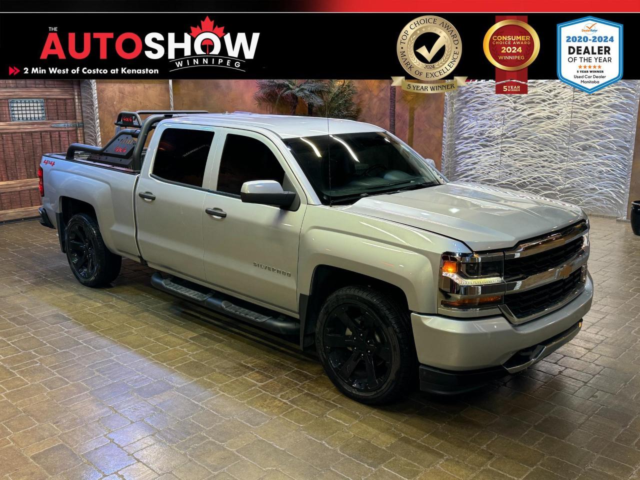 <strong>FEATURES OF THE 2018 CHEVROLET SILVERADO 1500 WORK TRUCK<br /><br />CONVENIENCE</strong><ul> <li>Air Conditioning</li> <li>Power Windows</li> <li>Assist Steps</li> <li>Bed Mounted Sport Bar</li></ul><b>SAFETY FEATURES</b><ul> <li>Daytime Running Lights</li> <li>Electronic Stability Control</li> <li>Traction Control</li> <li>Anti-Lock Brake System</li></ul><strong>TECHNOLOGY</strong><ul> <li>7-Inch Touch-Screen</li> <li>Bluetooth</li> <li>AM/FM Stereo</li> <li>6 Speakers</li></ul><strong>PERFORMANCE</strong><ul> <li>5.3L V8 Engine</li> <li>Automatic Transmission</li></ul><br /><br />Will accept trades. Please call (204)560-6287 or View at 3165 McGillivray Blvd. (Conveniently located two minutes West from Costco at corner of Kenaston and McGillivray Blvd.)<br /><br />In addition to this please view our complete inventory of used <a href=\https://www.autoshowwinnipeg.com/used-trucks-winnipeg/\>trucks</a>, used <a href=\https://www.autoshowwinnipeg.com/used-cars-winnipeg/\>SUVs</a>, used <a href=\https://www.autoshowwinnipeg.com/used-cars-winnipeg/\>Vans</a>, used <a href=\https://www.autoshowwinnipeg.com/new-used-rvs-winnipeg/\>RVs</a>, and used <a href=\https://www.autoshowwinnipeg.com/used-cars-winnipeg/\>Cars</a> in Winnipeg on our website: <a href=\https://www.autoshowwinnipeg.com/\>WWW.AUTOSHOWWINNIPEG.COM</a><br /><br />Complete comprehensive warranty is available for this vehicle. Please ask for warranty option details. All advertised prices, fees and payments plus taxes (where applicable).<br /><br />Winnipeg, MB - Manitoba Dealer Permit # 5851<p> </p>