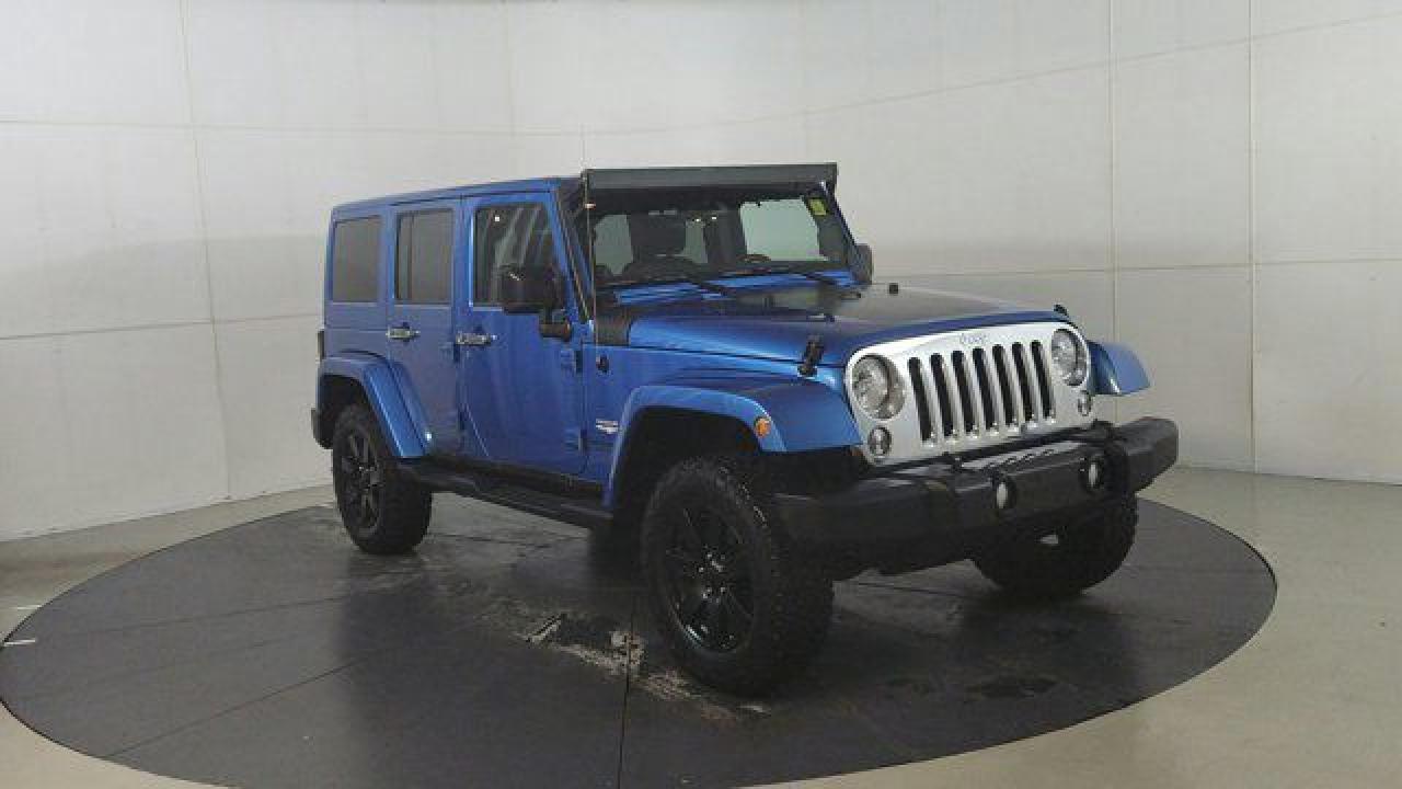 Used 2014 Jeep Wrangler Unlimited Sahara for sale in Winnipeg, MB