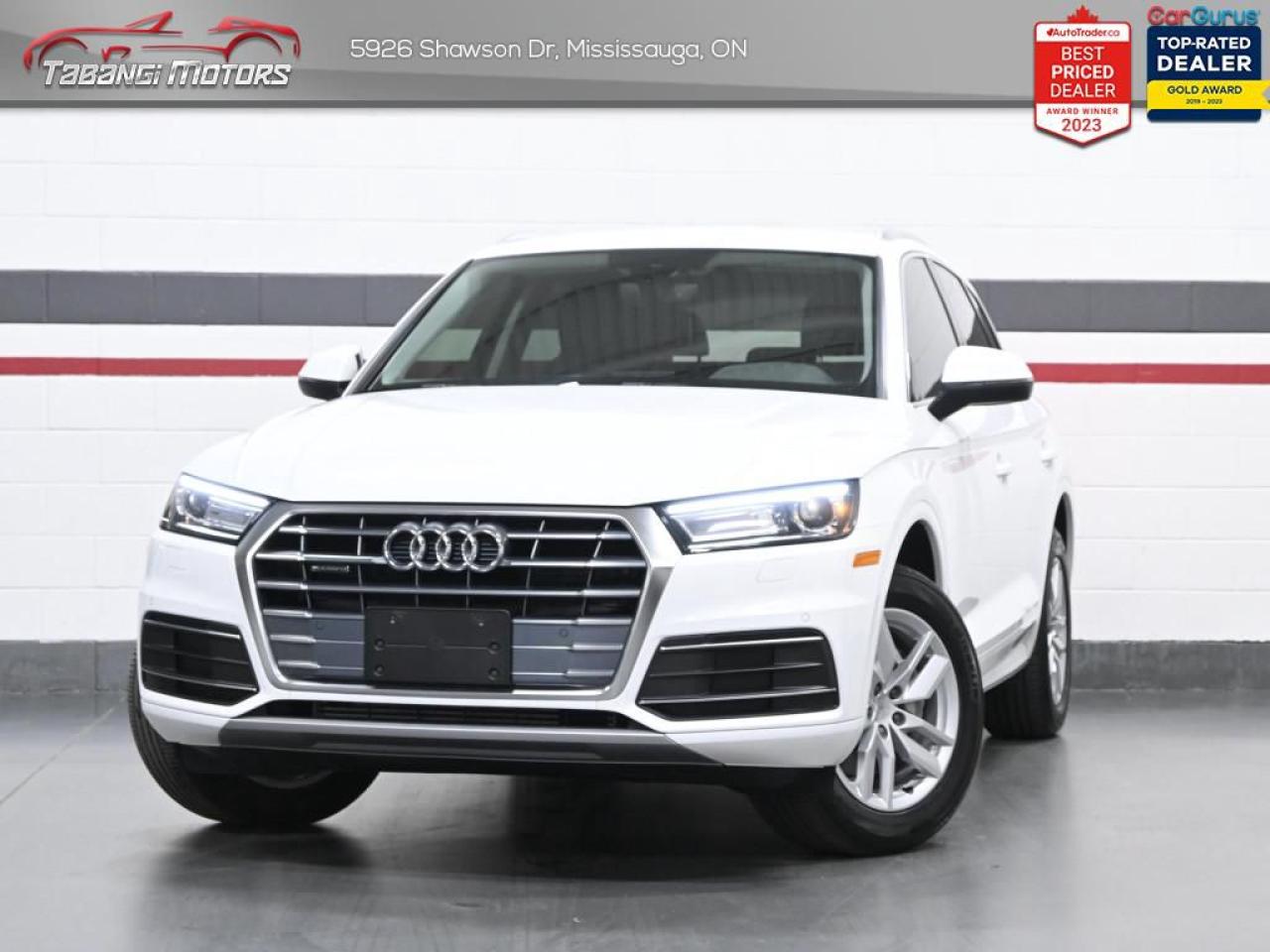 <b>Low Mileage, Apple Carplay, Android Auto, Heated Seats & Heated Steering Wheel, Audi Pre Sense, Audi Side Assist, Park Aid!<br></b><br>  Tabangi Motors is family owned and operated for over 20 years and is a trusted member of the Used Car Dealer Association (UCDA). Our goal is not only to provide you with the best price, but, more importantly, a quality, reliable vehicle, and the best customer service. Visit our new 25,000 sq. ft. building and indoor showroom and take a test drive today! Call us at 905-670-3738 or email us at customercare@tabangimotors.com to book an appointment. <br><hr></hr>CERTIFICATION: Have your new pre-owned vehicle certified at Tabangi Motors! We offer a full safety inspection exceeding industry standards including oil change and professional detailing prior to delivery. Vehicles are not drivable, if not certified. The certification package is available for $595 on qualified units (Certification is not available on vehicles marked As-Is). All trade-ins are welcome. Taxes and licensing are extra.<br><hr></hr><br> <br><iframe width=100% height=350 src=https://www.youtube.com/embed/x-X9LeaKZaI?si=LAT3JCbZBel3d5NU title=YouTube video player frameborder=0 allow=accelerometer; autoplay; clipboard-write; encrypted-media; gyroscope; picture-in-picture; web-share referrerpolicy=strict-origin-when-cross-origin allowfullscreen></iframe><br><br>   With astounding driving dynamics, a relaxing interior and desirable modern tech, this 2020 Q5 is an easy choice for a luxury crossover SUV. This  2020 Audi Q5 is fresh on our lot in Mississauga. <br> <br>This 2020 Audi Q5 has gone through another batch of refinement, sporting all new components hidden away under the shapely body, and a refined interior, offering more room and excellent comfort, surrounding the passengers in a tech filled cabin that follows Audis new interior design language. This low mileage  SUV has just 49,690 kms. Its  white in colour  . It has a 7 speed automatic transmission and is powered by a  248HP 2.0L 4 Cylinder Engine.  It may have some remaining factory warranty, please check with dealer for details.  This vehicle has been upgraded with the following features: Air, Rear Air, Tilt, Cruise, Power Windows, Power Locks, Power Mirrors. <br> <br>To apply right now for financing use this link : <a href=https://tabangimotors.com/apply-now/ target=_blank>https://tabangimotors.com/apply-now/</a><br><br> <br/><br>SERVICE: Schedule an appointment with Tabangi Service Centre to bring your vehicle in for all its needs. Simply click on the link below and book your appointment. Our licensed technicians and repair facility offer the highest quality services at the most competitive prices. All work is manufacturer warranty approved and comes with 2 year parts and labour warranty. Start saving hundreds of dollars by servicing your vehicle with Tabangi. Call us at 905-670-8100 or follow this link to book an appointment today! https://calendly.com/tabangiservice/appointment. <br><hr></hr>PRICE: We believe everyone deserves to get the best price possible on their new pre-owned vehicle without having to go through uncomfortable negotiations. By constantly monitoring the market and adjusting our prices below the market average you can buy confidently knowing you are getting the best price possible! No haggle pricing. No pressure. Why pay more somewhere else?<br><hr></hr>WARRANTY: This vehicle qualifies for an extended warranty with different terms and coverages available. Dont forget to ask for help choosing the right one for you.<br><hr></hr>FINANCING: No credit? New to the country? Bankruptcy? Consumer proposal? Collections? You dont need good credit to finance a vehicle. Bad credit is usually good enough. Give our finance and credit experts a chance to get you approved and start rebuilding credit today!<br> o~o