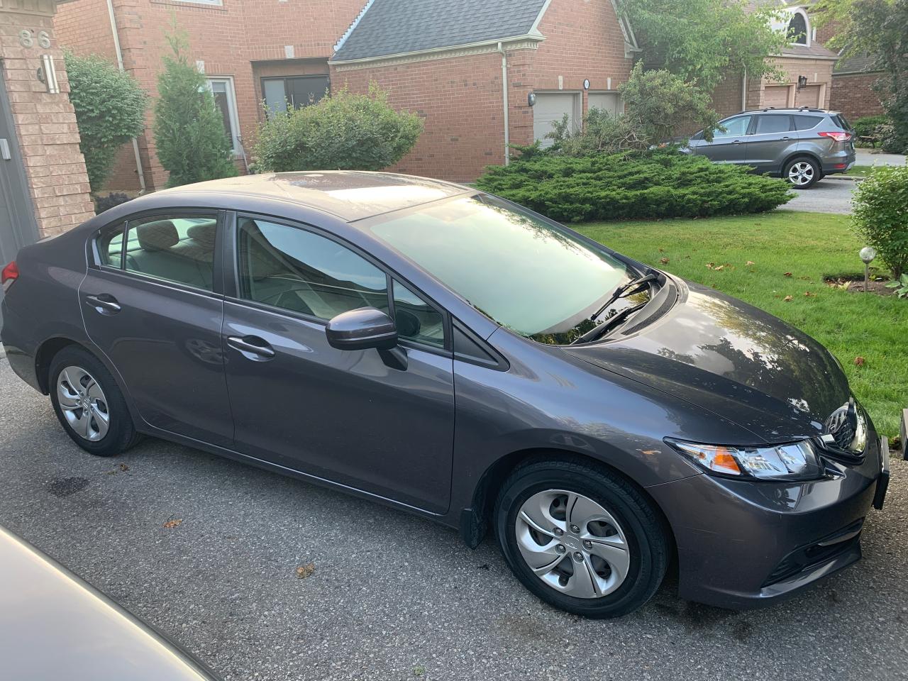 <div>YES,....ONLY 70,997KMS!!! NOT A MISPRINT!</div><div> </div><div>2014 HONDA CIVIC LX - 4 DOOR SEDAN</div><div> </div><div>FULLY EQUPPED WITH AUTOMATIC TRANSMISSION, AIR COND., POWER WINDOWS/STEERING/BRAKES, ABS, AM/FM/ CD, AND MUCH MORE!!</div><div> </div><div>FEEL FREE TO BRING ALONG YOUR OWN PERSONAL MECHANIC TO PERFORM A PRE-PURCHASE INSPECTION PRIOR TO PURCHASING.</div><div> </div><div>SELLING AS-IS- AS TRADED-IN.</div><div> </div><div>AT THIS PRICE (NOT CERTIFIED) - This vehicle is being sold “AS IS,” unfit, not e-tested and is not represented as being in road worthy condition, mechanically sound or maintained at any guaranteed level of quality. The vehicle may not be fit for use as a means of transportation and may require substantial repairs at the purchaser’s expense. It may not be possible to register the vehicle to be driven in its current condition.”</div><div> </div><div>PLEASE SCHEDULE AN APPOINTMENT PRIOR TO VISITING US IN ORDER TO ENSURE THAT  YOUR VEHICLE OF CHOICE IS ON-SITE, AND STILL AVAILABLE .</div><div> </div><div>RICHSTONE FINE CARS INC.</div><div>855 ALNESS STREET, UNIT 17</div><div>TORONTO </div><div>M3J 2X3</div><div> </div><div>416-274-AUTO (2886)</div><div> </div><div>SERVING GTA/TORONTO AND CANADA SINCE 2000!! CELEBRATING 25 YEARS OF SERVICE!! </div>