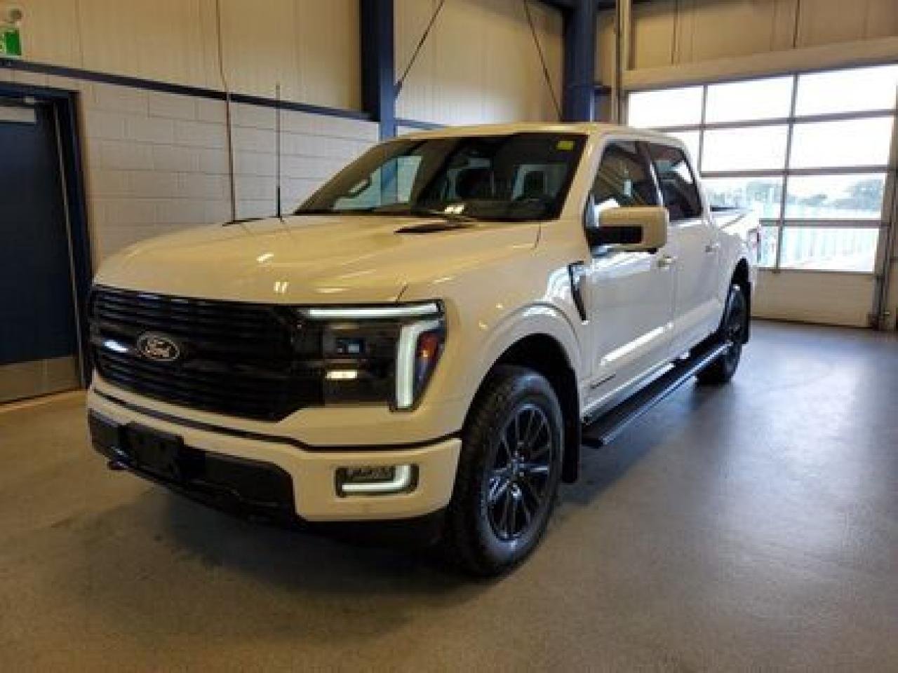 This all new, full sized 2024 Ford F-150 Platinum 702A looks absolutely stunning in Star White Metallic. This pick up comes with the 3.5L EcoBoost engine. This remarkable engine not only produces 400 horsepower and 500 ft pounds of torque, but by leveraging the EcoBoost technology and a 10-speed automatic transmission this truck is rated it to get 10.8L 100/km (26 miles per gallon) combined highway/city fuel economy. This truck can tow up to a massive amount of 13,200 pounds!

Key Features:
Engine Block Heater
Liner-Tray Style W/Carpet Mats
BlueCruise Equip: 3 Year Plan
FX4 Off Road Package
Skid Plates
Max Recline Driver/Passenger Seat
Wheel Well Liner
Heated Steering Wheel 
Universal Garage Door Opener 
Rain Sensing Wipers
Remote Tailgate Release
Heads Up Display
Mobile Office Package 
Adaptive Cruise Control 
Multi Contour Front Seats 
Ventilated Front Seats 
Lane Centering 
Heated Front Seats
Heated Rear Seats 
Lane Keeping System 
B&O Sound System Unleashed Sound System 
Power Adjustable Pedal W/Memory
Rear View Camera 
Auto Dimming Rearview Mirror 
360 Degree Camera 
Pro Trailer Backup Assist 
Pro Trailer Hitch Assist 
Dual Exhaust 
Reverse Sensing System 
Reverse Brake Assist 
12 LCD Touchscreen 
Apple Car Play / Android Auto 
Rear Window Defroster 
20 Black Painted Aluminum Wheels 
Hill Start Assist 
Class IV Trailer Hitch 

Saskatchewan has a challenging climate and driving conditions but let that stress melt away with the 2024 F-150 Platinum, a tough truck that leverages physical features and technology that will keep your family safe. This specific unit is loaded right up and includes power windows, power locks, air conditioning, 10-way power drivers seat, wrapped steering wheel, zone lighting, cruise, dynamic brake support, outside temperature display, hill start assist, perimeter safety system, four-wheel drive, and so much more. 

At Moose Jaw Ford, we're driving change all across Saskatchewan! We are Moose Jaw's prime destination for everything automotive. We pride ourselves by consistently providing the highest quality customer experience  every single time. Because of this commitment, and the love of what we do, Moose Jaw Ford is the recipient of multiple President's Club Awards and is recognized as one of Canada's Best Managed Companies. We are dedicated to building long lasting relationships. You can trust that our trained service technicians will take excellent care of you and your vehicle when you visit our service department. Come visit us today at 1010 North Service Road..