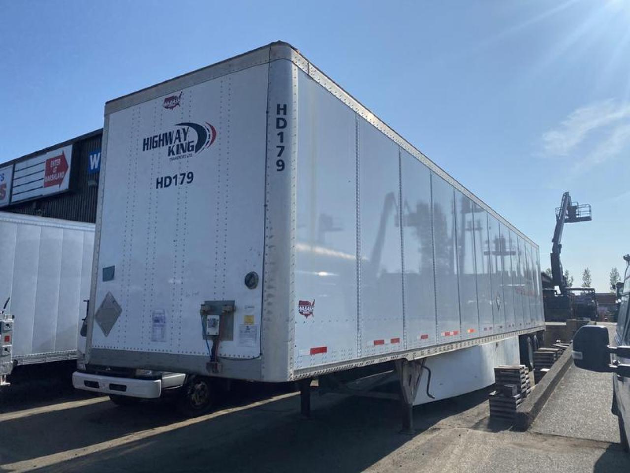 Used 2023 WABASH International DVCVHPC Floor 53 foot x 102 in Tandem Axle Van Trailer for sale in Burnaby, BC