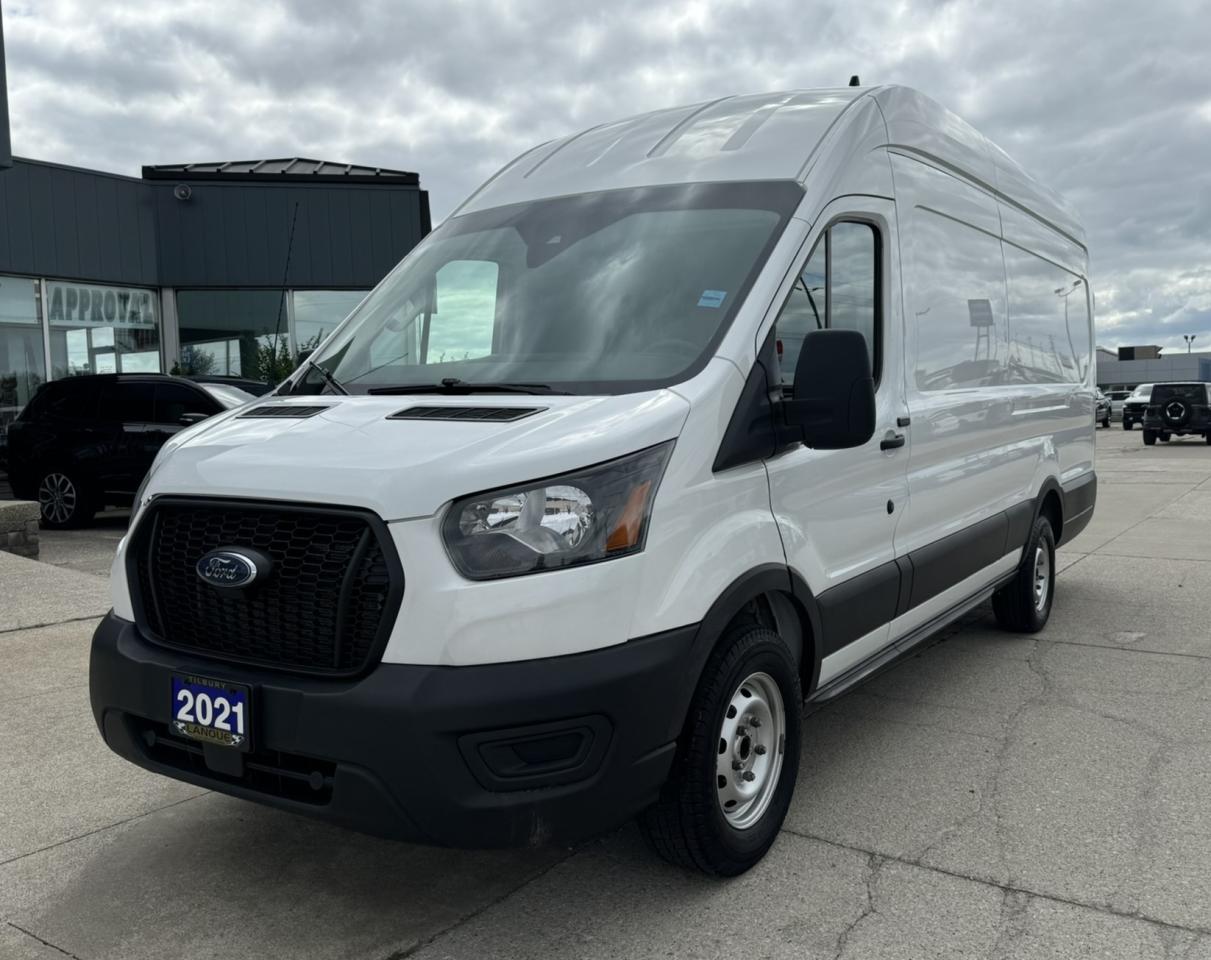 <p style=text-align: center;><strong><span style=font-size: 18pt;>2021 FORD TRANSIT T-250 148 HI RF RWD</span></strong></p><p style=text-align: center;><strong><span style=font-size: 18pt;>3.5L PFDI V6 ENGINE</span></strong></p><p style=text-align: center;><span style=font-size: 14pt;>275 HORSEPOWER | 262 LB-FT OF TORQUE</span></p><p style=text-align: center;><strong><span style=font-size: 18pt;>10-SPEED SELECTSHIFT AUTOMATIC TRANSMISSION</span></strong></p><p style=text-align: center;><strong><span style=font-size: 18pt;>16 WHITE STEEL W/ MINI CAP AND LUG NUT COVERS</span></strong></p><p style=text-align: center;> </p><p style=text-align: center;><strong><span style=font-size: 14pt;>MECHANICAL</span></strong></p><p style=text-align: center;><span style=font-size: 14pt;>25-gallon (94.6L) fuel tank, 70-amp-hr battery, 250-amp alternator, Auxiliary fuel port, Electric parking brake, Electric power-assisted steering (EPAS), Front suspension: independent MacPherson-strut and stabilizer bar;  Rear: leaf springs and heavy-duty gas shock absorbers, Power 4-wheel disc brakes with Anti-Lock Brake System (ABS), Selectable Drive Modes (Normal, Eco, Tow/Haul), Single-note horn</span></p><p style=text-align: center;><strong><span style=font-size: 14pt;>FORD CO-PILOT360™ TECHNOLOGY</span></strong></p><p style=text-align: center;><span style=font-size: 14pt;>Auto High-Beam Headlamps, Autolamp (Automatic On/Off Headlamps), Hill Start Assist, Lane-Keeping System, Post-Collision Braking, Pre-Collision Assist with Automatic Emergency Braking (AEB) including Pedestrian Detection and Forward Collision Warning, Side-Wind Stabilization</span></p><p style=text-align: center;><strong><span style=font-size: 14pt;>INTERIOR </span></strong></p><p style=text-align: center;><span style=font-size: 14pt;>Bluetooth® functionality, FordPass™ Connect with 4G LTE Wi-Fi hotspot capability, 12V powerpoints (2), Accessory delay, Armrests – Driver and front-passenger inboard, Front dome light with map lights and theater-dimming feature, Grab handle on passenger-side A-pillar, Lockable glove box, Polyurethane steering wheel with tilt/telescoping column, Power door locks with autolock, Power front windows, Rearview mirror, Remote Keyless Entry System with 2 key fobs</span></p><p style=text-align: center;><strong><span style=font-size: 14pt;>EXTERIOR</span></strong></p><p style=text-align: center;><span style=font-size: 14pt;>Carbon Black bodyside moldings, Easy Fuel® capless fuel filler, Front fender-mounted antenna, Solar-tinted glass, Variable-intermittent windshield wipers</span></p><p style=text-align: center;><strong><span style=font-size: 14pt;>SAFETY & SECURITY</span></strong></p><p style=text-align: center;><span style=font-size: 14pt;>3-point safety belts for all seating positions, Driver and front-passenger front airbags, Front-seat side airbags, Safety Canopy® side-curtain airbags, AdvanceTrac® with Roll Stability Control, SecuriLock® Passive Anti-Theft System, SOS Post-Crash Alert System, Tire Pressure Monitoring System (excludes spare)</span></p><p style=text-align: center;> </p><p style=text-align: center;> </p><p style=box-sizing: border-box; margin-bottom: 1rem; margin-top: 0px; color: #212529; font-family: -apple-system, BlinkMacSystemFont, Segoe UI, Roboto, Helvetica Neue, Arial, Noto Sans, Liberation Sans, sans-serif, Apple Color Emoji, Segoe UI Emoji, Segoe UI Symbol, Noto Color Emoji; font-size: 16px; background-color: #ffffff; text-align: center; line-height: 1;><span style=box-sizing: border-box; font-family: arial, helvetica, sans-serif; font-size: 14pt;><span style=box-sizing: border-box; font-weight: bolder;><span style=box-sizing: border-box;>Here at Lanoue/Amfar Sales, Service & Leasing in Tilbury, we take pride in providing the public with a wide variety of High-Quality Pre-owned Vehicles. We recondition and certify our vehicles to a level of excellence that exceeds the Status Quo. We treat our Customers like family and provide the highest level of service from Start to Finish. If you’d like a smooth & stress-free car shopping experience, give one of our Sales Associates a call at 1-844-682-3325 to help you find your next NEW-TO-YOU vehicle!</span></span></span></p><p style=box-sizing: border-box; margin-bottom: 1rem; margin-top: 0px; color: #212529; font-family: -apple-system, BlinkMacSystemFont, Segoe UI, Roboto, Helvetica Neue, Arial, Noto Sans, Liberation Sans, sans-serif, Apple Color Emoji, Segoe UI Emoji, Segoe UI Symbol, Noto Color Emoji; font-size: 16px; background-color: #ffffff; text-align: center; line-height: 1;><span style=box-sizing: border-box; font-family: arial, helvetica, sans-serif; font-size: 14pt;><span style=box-sizing: border-box; font-weight: bolder;><span style=box-sizing: border-box;>Although we try to take great care in being accurate with the information in this listing, from time to time, errors occur. The vehicle is priced as it is physically equipped. Minor variances will not effect pricing. Please verify the vehicle is As Expected when you visit. Thank You!</span></span></span></p><p style=text-align: center;> </p>