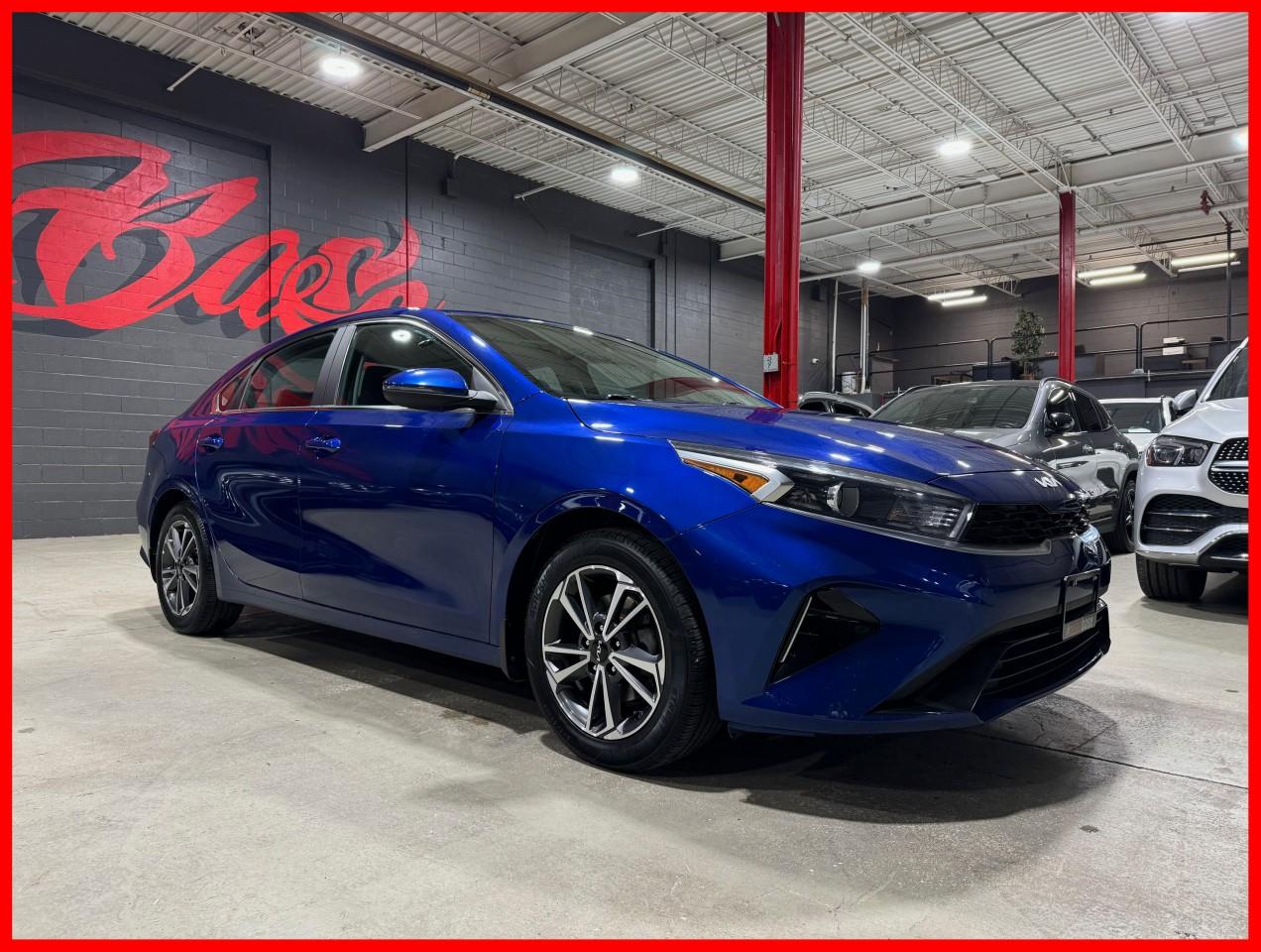 <p>Hyper Blue Exterior On Black Cloth Interior</p><p></p><p>One Owner, Local Ontario Vehicle, Ex Daily Rental, Certified, Extended Warranty Options Available, Financing Is Available For All Credit, Trade-Ins Are Welcome!</p><p></p><p>This 2022 Kia Forte EX Package Is Loaded With A Bluetooth/Apple CarPlay/Android Auto, 6 Speaker Sound System w/ 8" display audio, Blind Spot Detection & Lane Keeping Assist, Forward Collision-Avoidance Assist & Rear Cross Traffic Alert, Heated Front Bucket Seats, Heated Leather Steering Wheel, Remote Keyless Entry, Back-Up Camera, 17" Alloy (Graphite) Wheels, And More!</p><p></p><p>We Do Not Charge Any Additional Fees For Certification, Its Just The Price Plus HST And Licencing.</p><p></p><p>Follow Us On Instagram, And Facebook.</p><p></p><p>Dont Worry About Rain, Or Snow, Come Into Our 20,000sqft Indoor Showroom, We Have Been In Business For A Decade, With Many Satisfied Clients That Keep Coming Back, And Refer Their Friends And Family. We Are Confident You Will Have An Enjoyable Shopping Experience At AutoBase. If You Have The Chance Come In And Experience AutoBase For Yourself.</p>