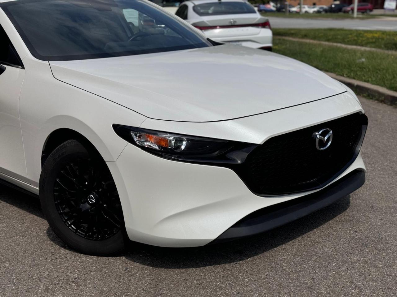 2021 Mazda MAZDA3 GX Photo3