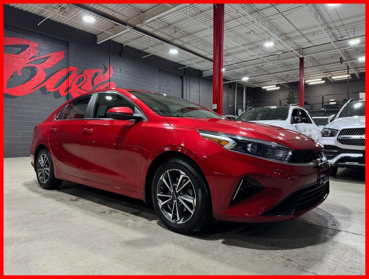 <p>Radiant Red Exterior On Black Cloth Interior</p><p></p><p>One Owner, Local Ontario Vehicle, Ex Daily Rental, Certified, Extended Warranty Options Available, Financing Is Available For All Credit, Trade-Ins Are Welcome!</p><p></p><p>This 2022 Kia Forte EX Package Is Loaded With A Bluetooth/Apple CarPlay/Android Auto, 6 Speaker Sound System w/ 8" display audio, Blind Spot Detection & Lane Keeping Assist, Forward Collision-Avoidance Assist & Rear Cross Traffic Alert, Heated Front Bucket Seats, Heated Leather Steering Wheel, Remote Keyless Entry, Power Sunroof, Back-Up Camera, 17" Alloy (Graphite) Wheels, And More!</p><p>We Do Not Charge Any Additional Fees For Certification, Its Just The Price Plus HST And Licencing.</p><p></p><p>Follow Us On Instagram, And Facebook.</p><p></p><p>Dont Worry About Rain, Or Snow, Come Into Our 20,000sqft Indoor Showroom, We Have Been In Business For A Decade, With Many Satisfied Clients That Keep Coming Back, And Refer Their Friends And Family. We Are Confident You Will Have An Enjoyable Shopping Experience At AutoBase. If You Have The Chance Come In And Experience AutoBase For Yourself.</p>