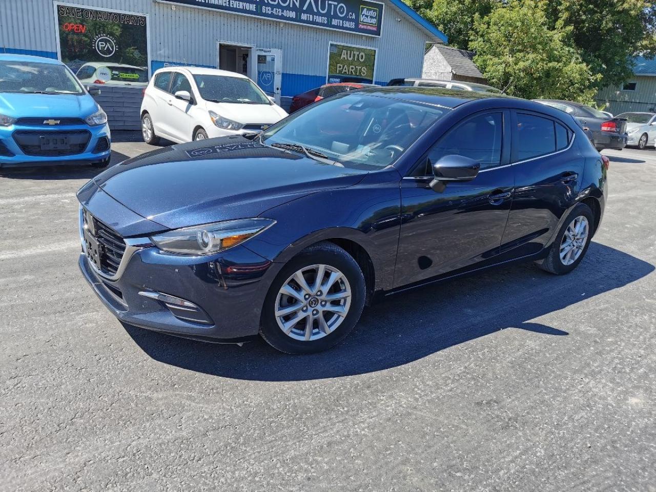 <p>HEATED WHEEL-SEAT-SUNROOF-BACK UP CAM-WE FINANCE Attention all car enthusiasts! Get ready to rev up your engines with the 2018 Mazda MAZDA3 i Touring, now available at our dealership. This pre-owned beauty is ready to hit the road with its powerful 2.0L L4 DOHC 16V engine. With sleek and stylish design, this car is sure to turn heads wherever you go. Don't miss out on the opportunity to own this reliable and efficient vehicle. Come visit us at Patterson Auto Sales and take it for a test drive today!</p>